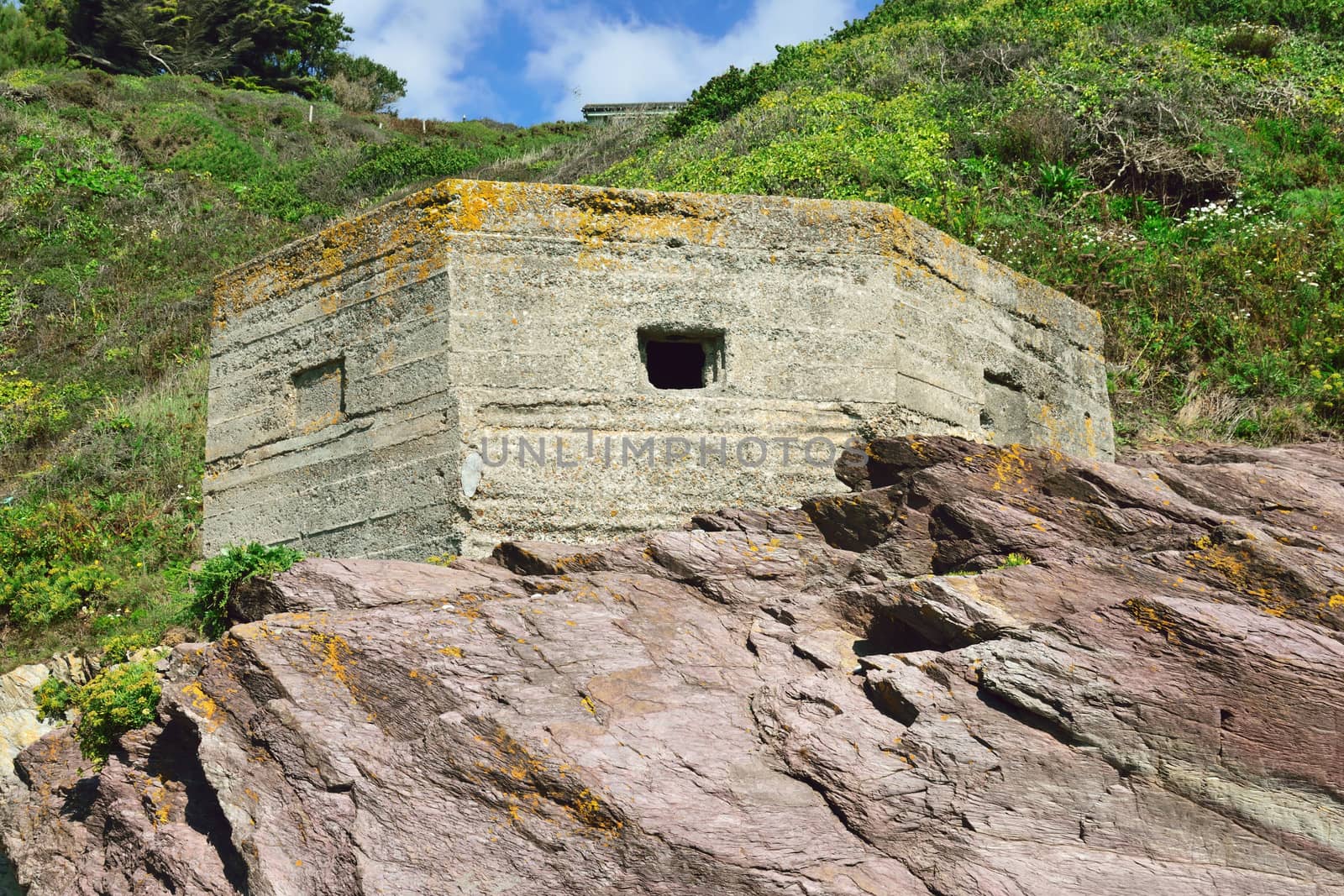 World War 2 Pill Boxespart of the  defence against nazi invasion. On a beach in Cornwall UK.