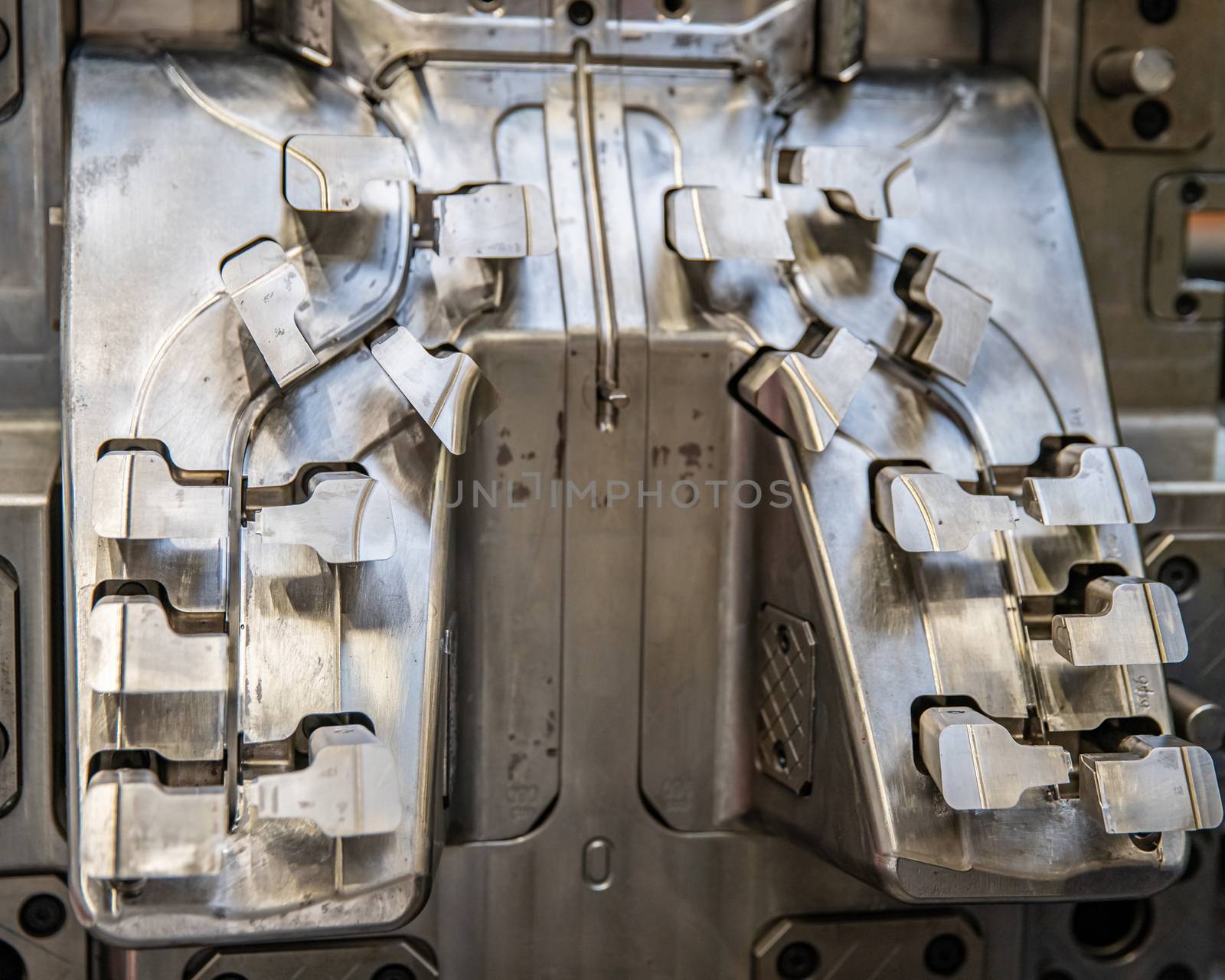 metal mold for the production of plastic moldings for the automotive industry.