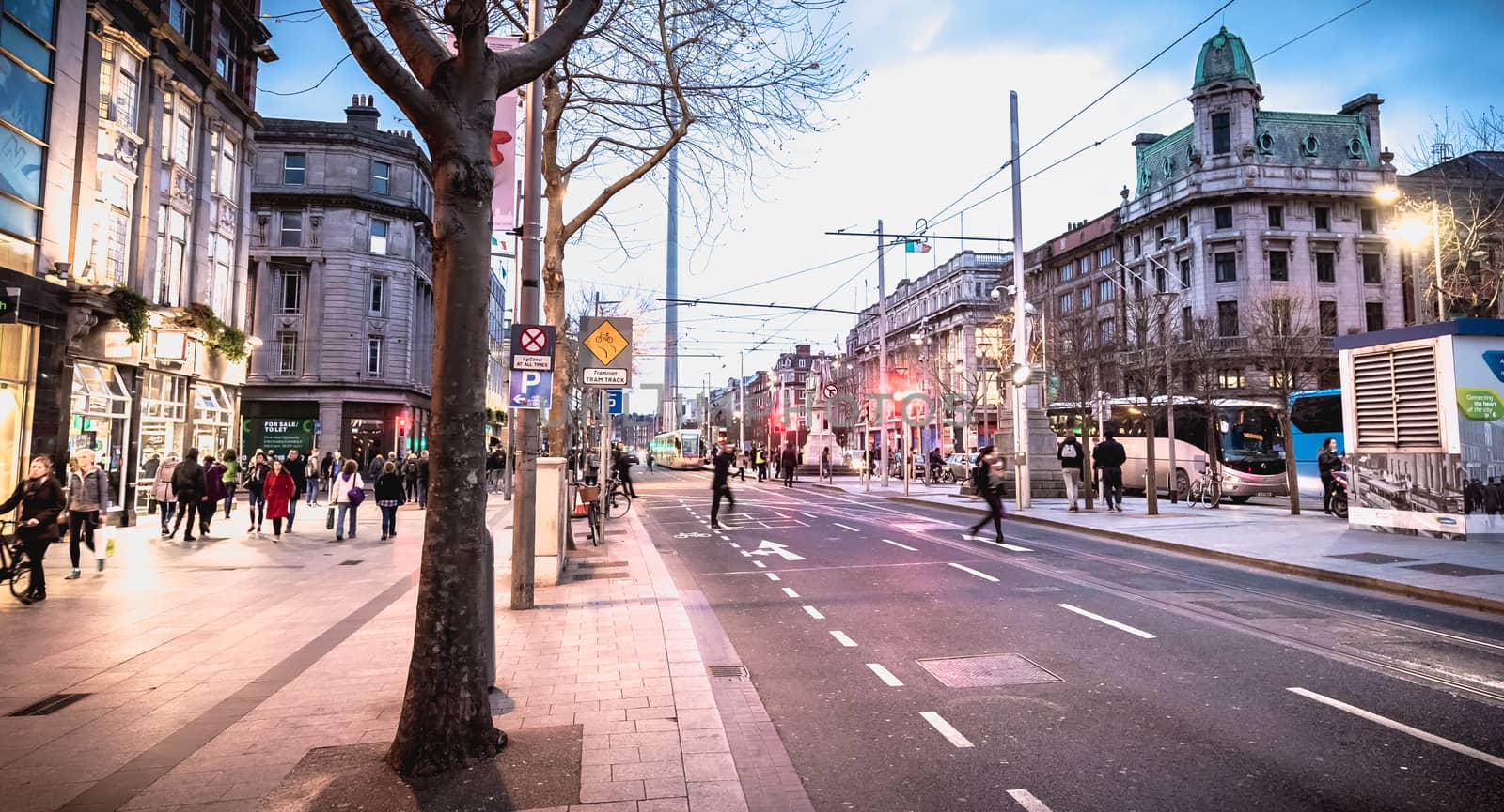 Dublin, Ireland - February 12, 2019: Night street atmosphere in the streets of the historic center where people walk on a winter day