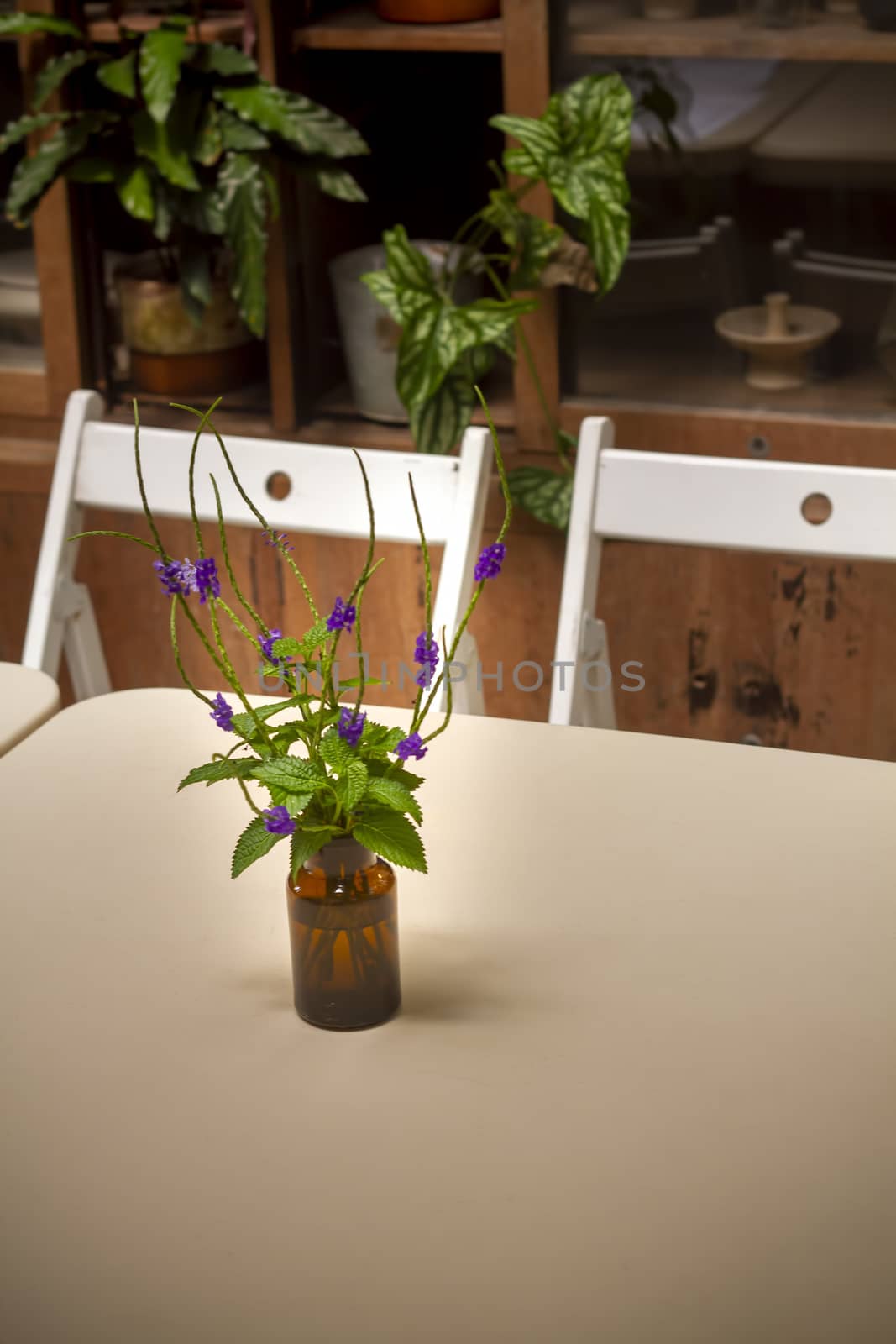 Bouquet flower in jar on the table