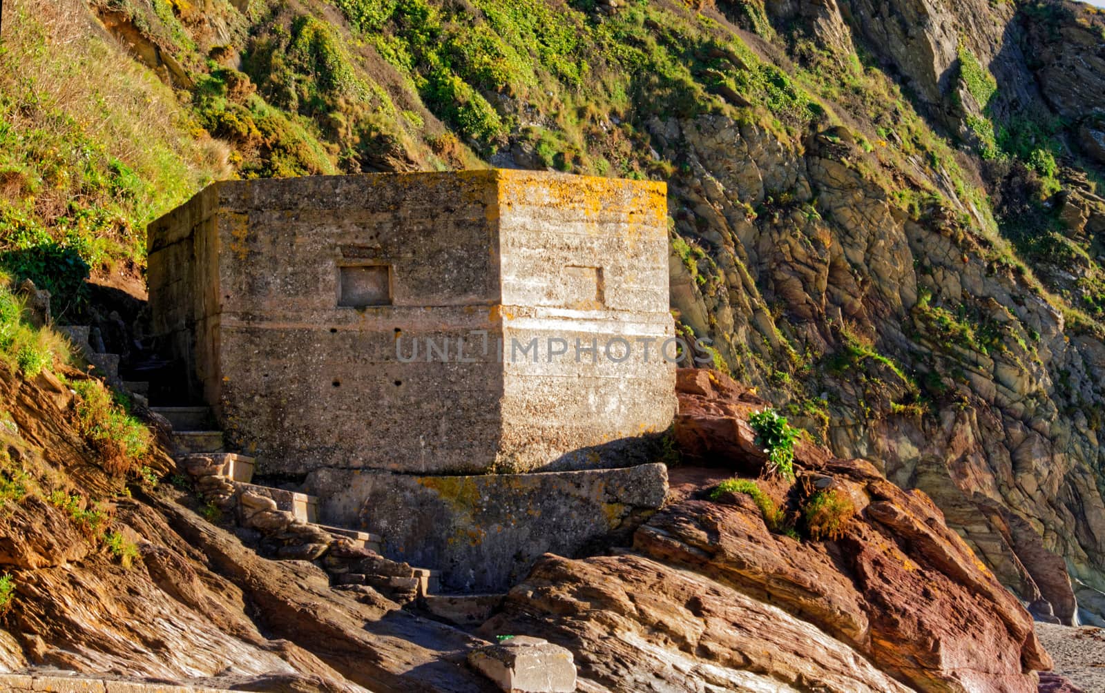 World War 2 Pill Boxespart of the  defence against nazi invasion. On a beach in Cornwall UK.