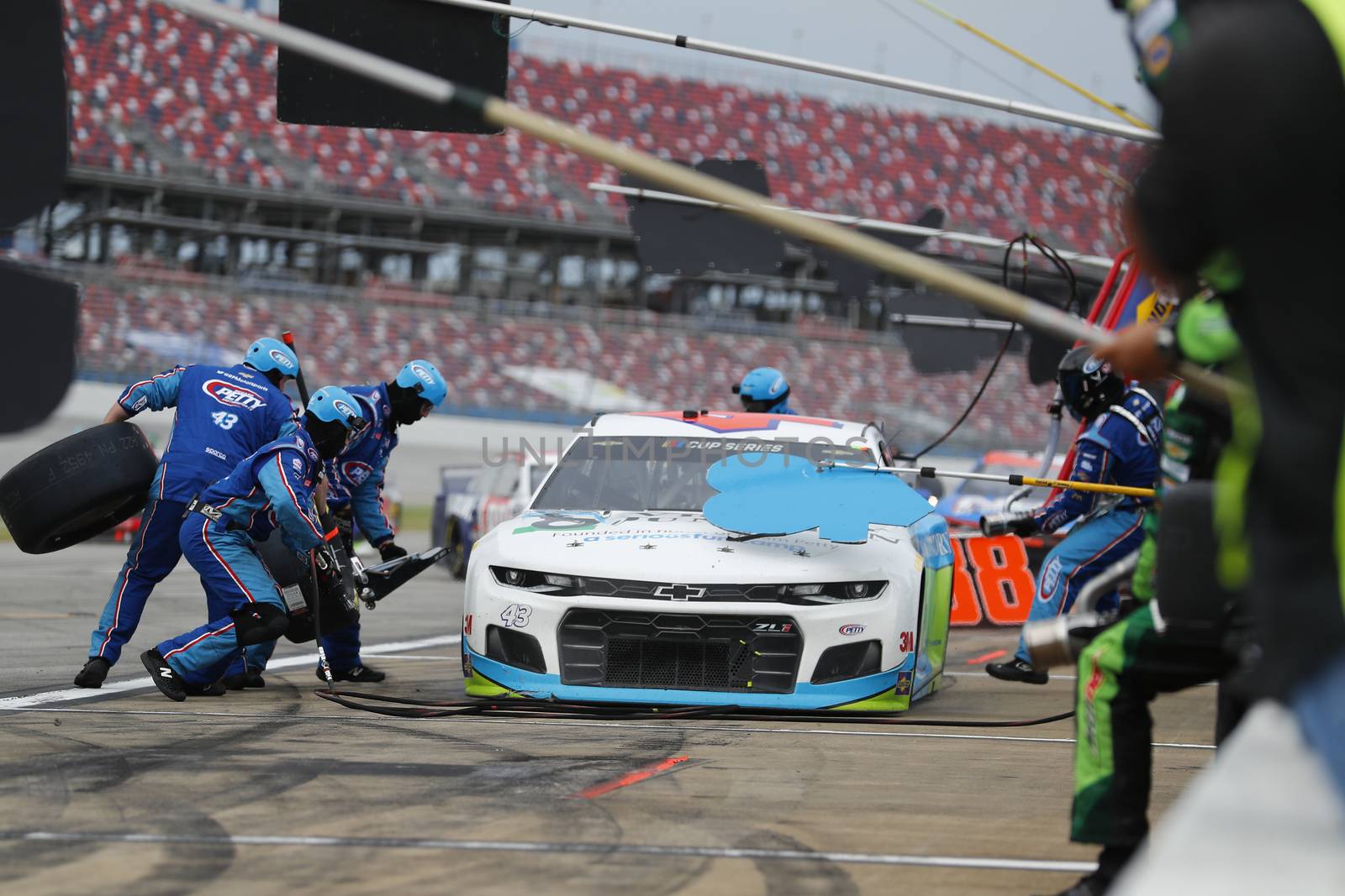 Darrell Wallace, Jr (43) makes a pit stop for the GEICO 500 at Talladega Superspeedway in Lincoln, Alabama.