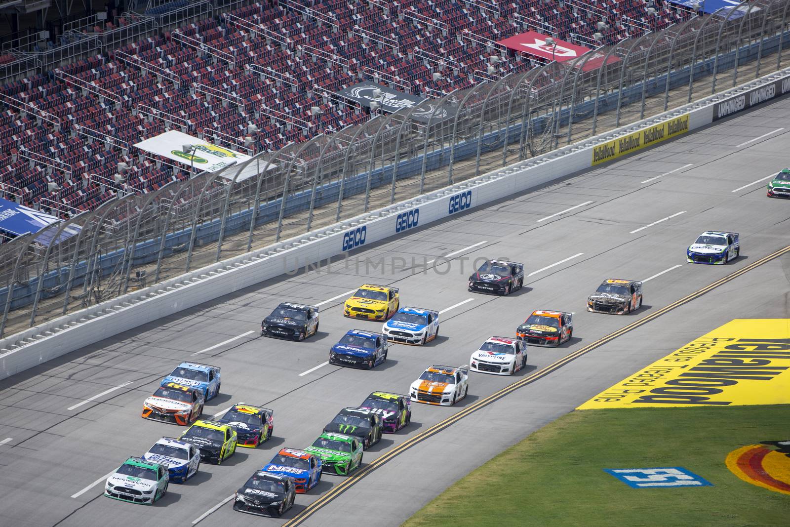 Joey Logano (22) races for position for the GEICO 500 at Talladega Superspeedway in Lincoln, Alabama.