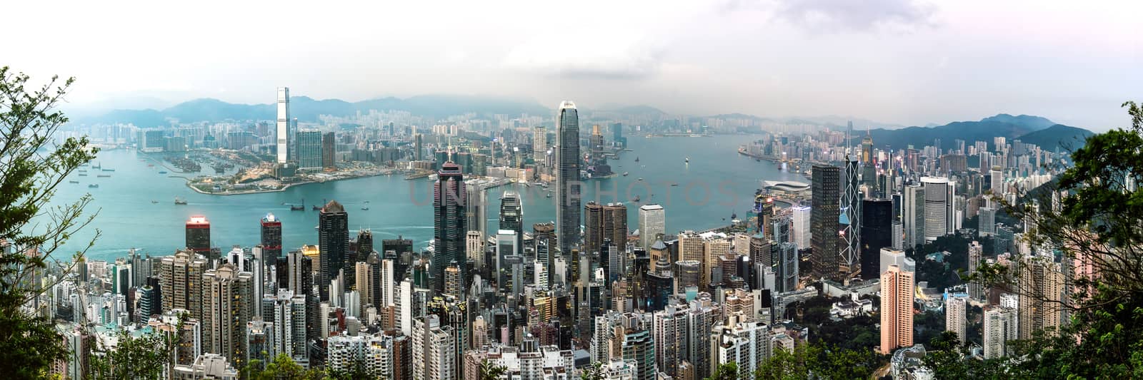 Panorama view of Hong Kong skyline on the evening seen from Victoria peak, Hong Kong, China.