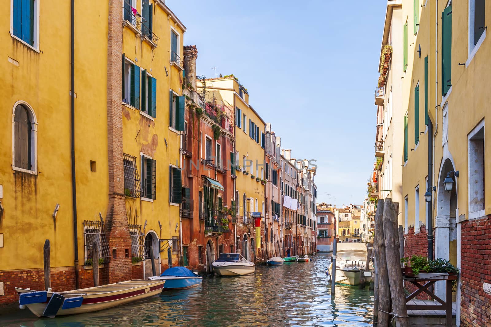 Typical facades along the canals in Venice in Veneto in the north-east of Italy.