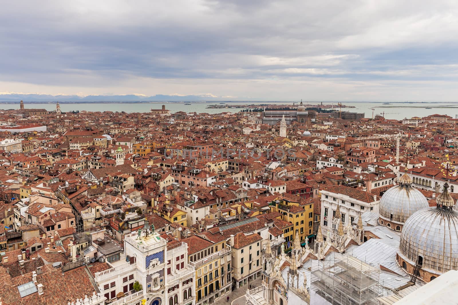 Panoramic aerial view from the bell tower of Saint Mark's square which offers a magnificent panorama over the rooftops of Venice and beyond.