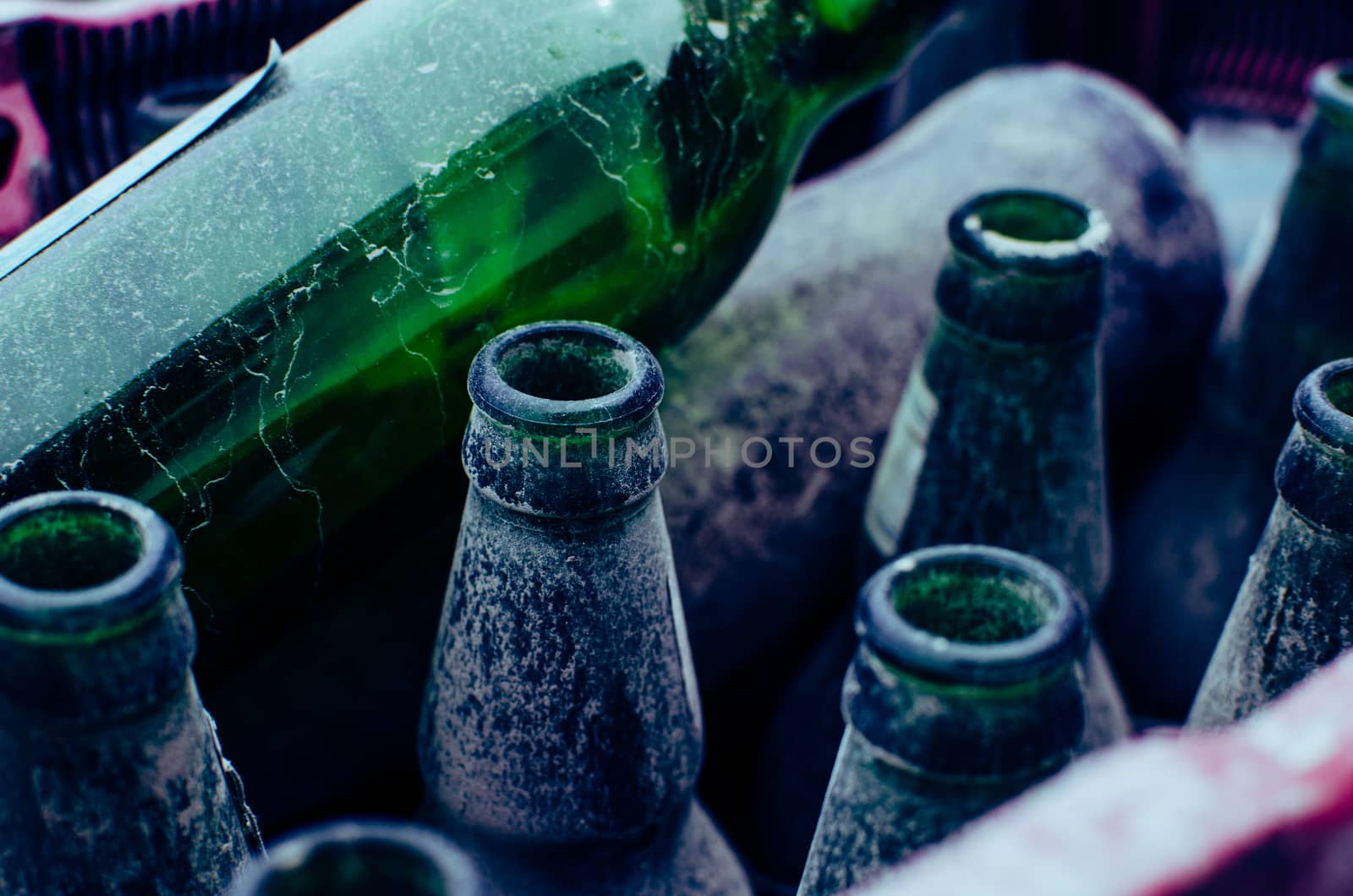 Glass bottles old and damaged by time