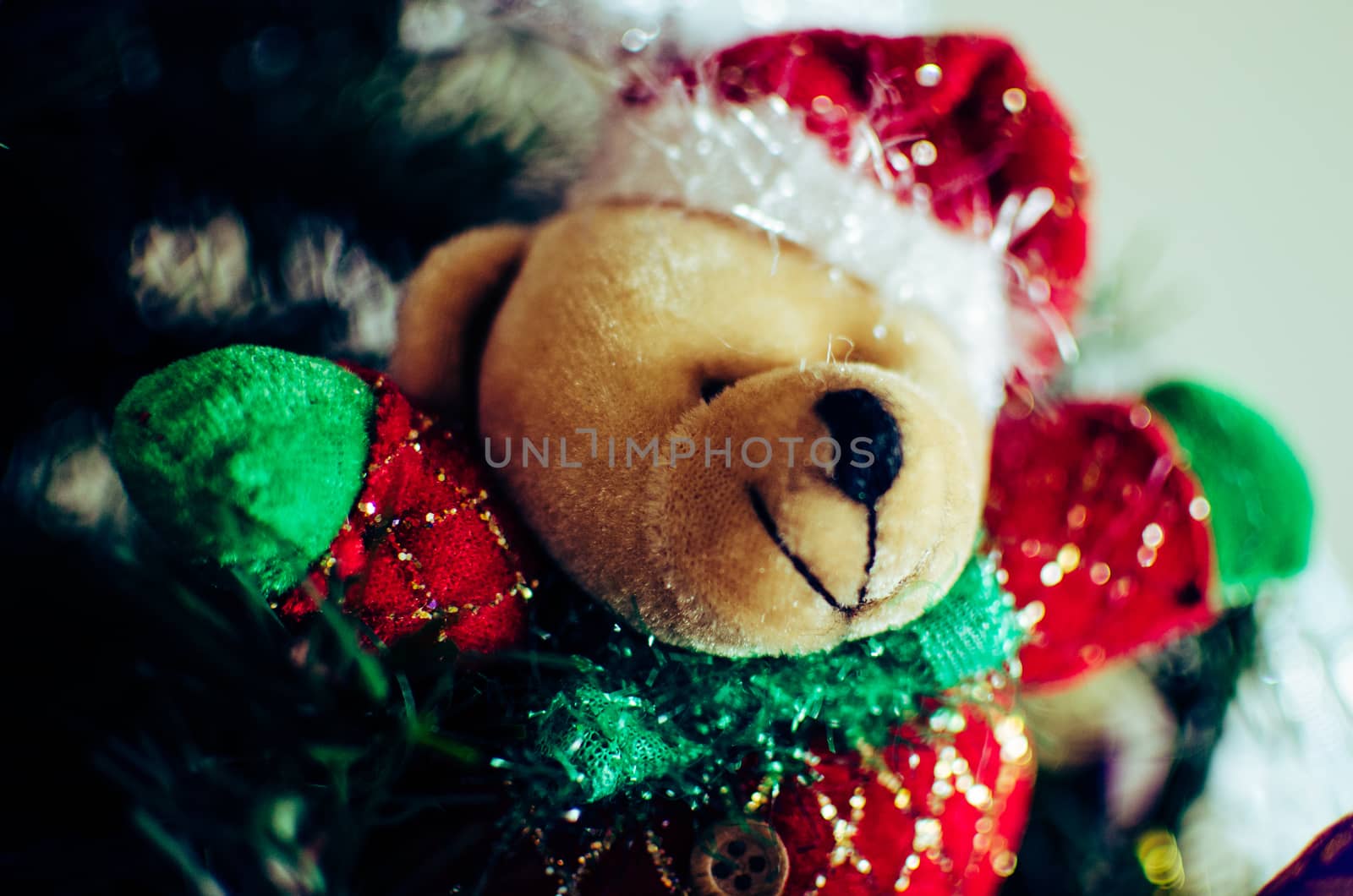 Teddy bear dressed in Christmas decoration