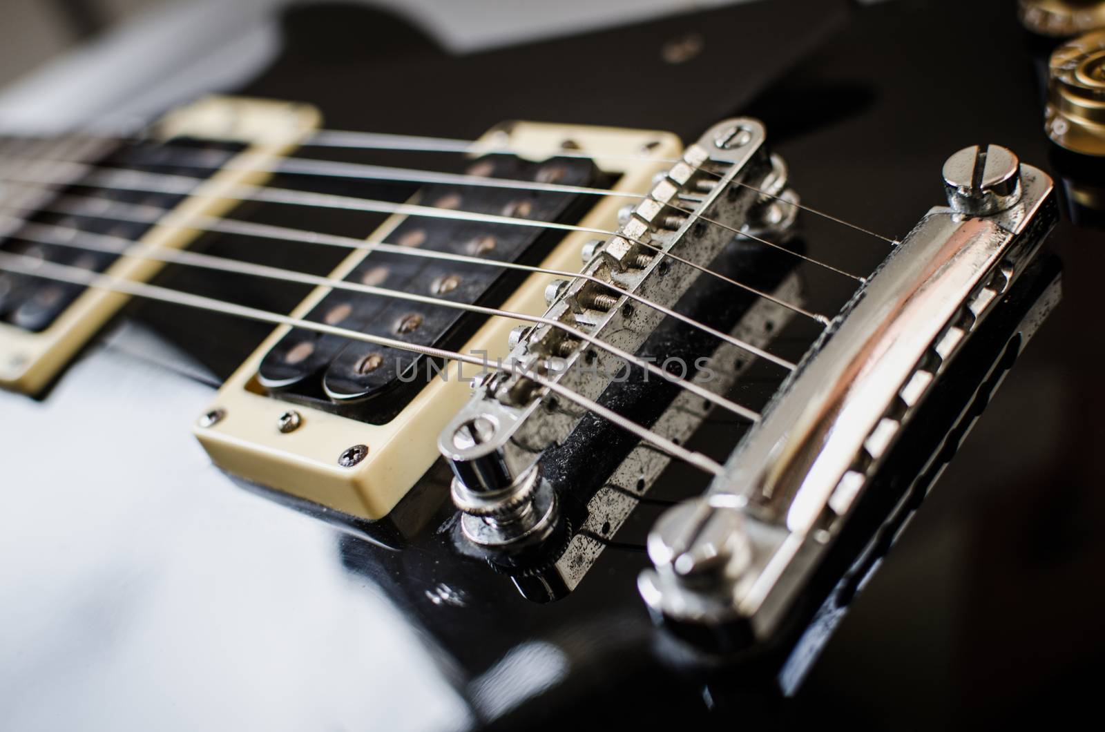 Parts of a guitar, bridge and pickups