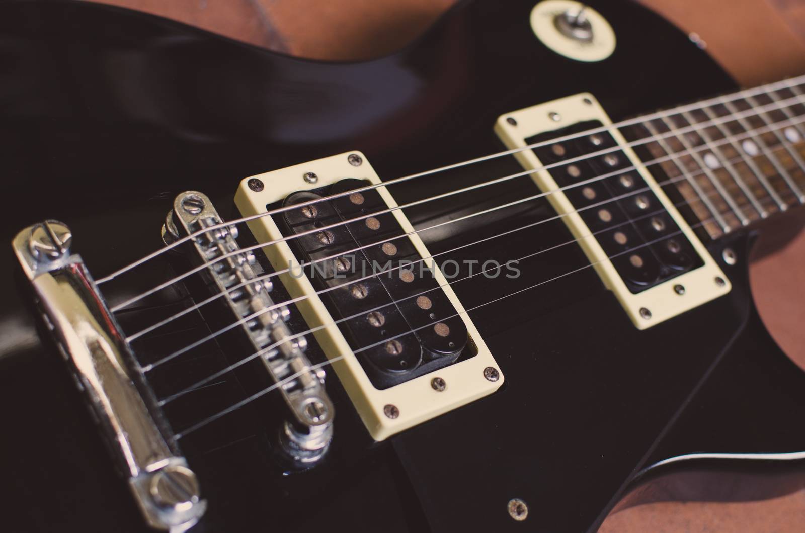 Parts of a guitar, bridge and pickups