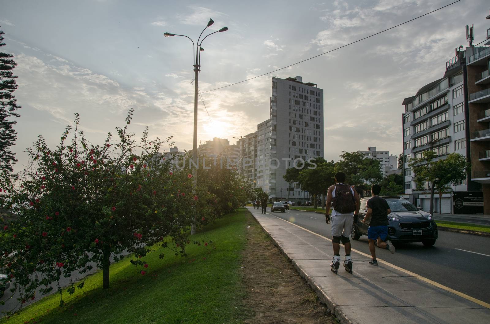 Skater and runner through the streets of Miraflores