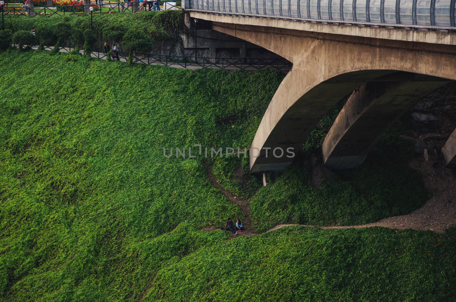 Under the bridge called "Videna" a couple sitting