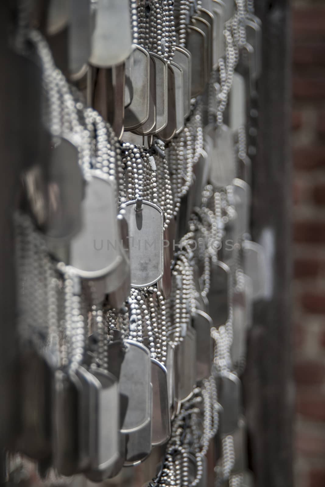 Symbolically blank soldier dog tags at a memorial