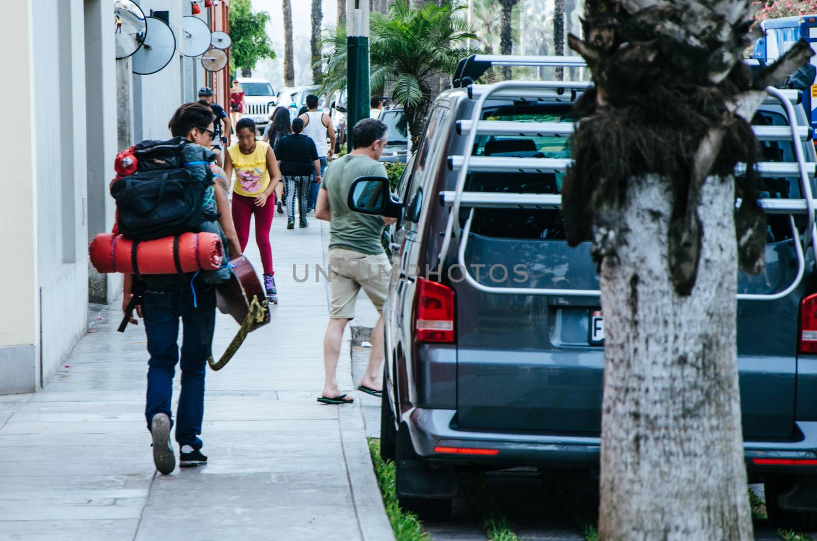 Backpacker walking through the streets of Barranco in Lima - Peru
