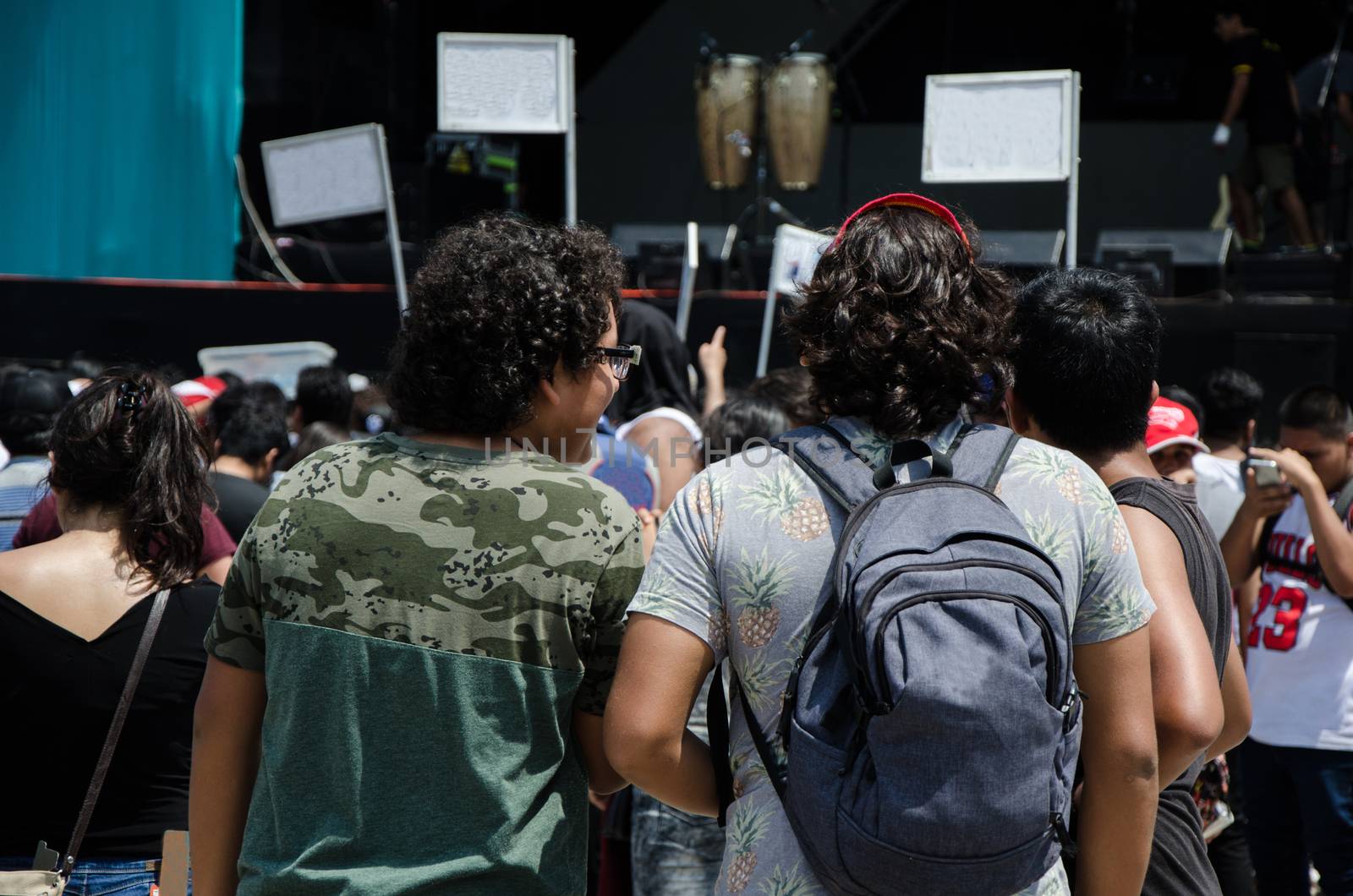 Two friends enjoying the rock concert in Lima - Peru