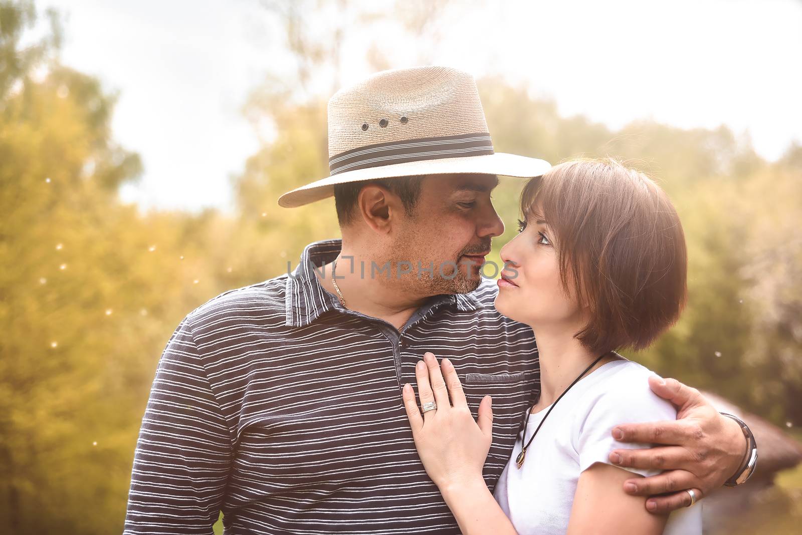 photo portrait of a happy middle-aged couple in nature, love concept