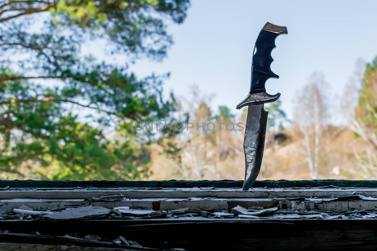 a terrible old combat knife stuck in the ruined window sill by jk3030