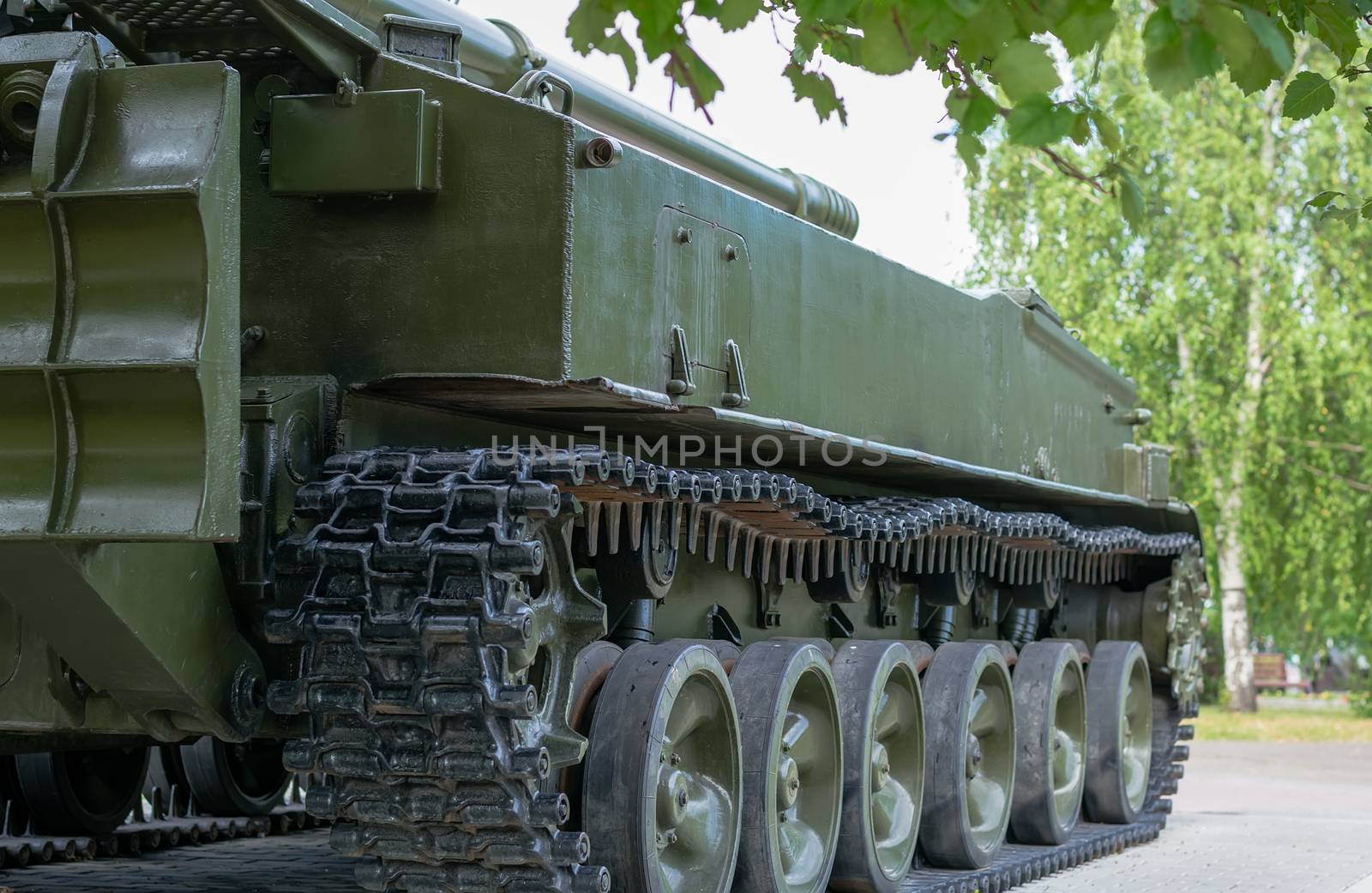 military tracked artillery howitzer stands on the alley in the Park by jk3030