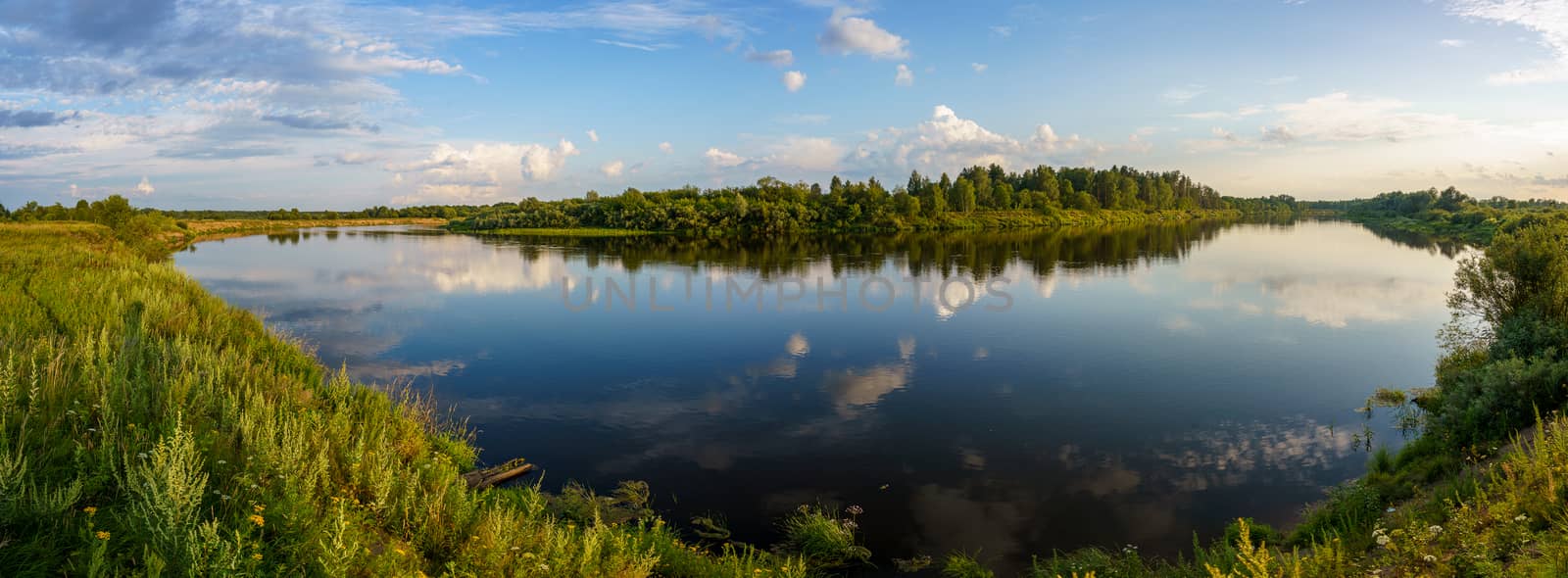 panorama of the river with green banks by VADIM