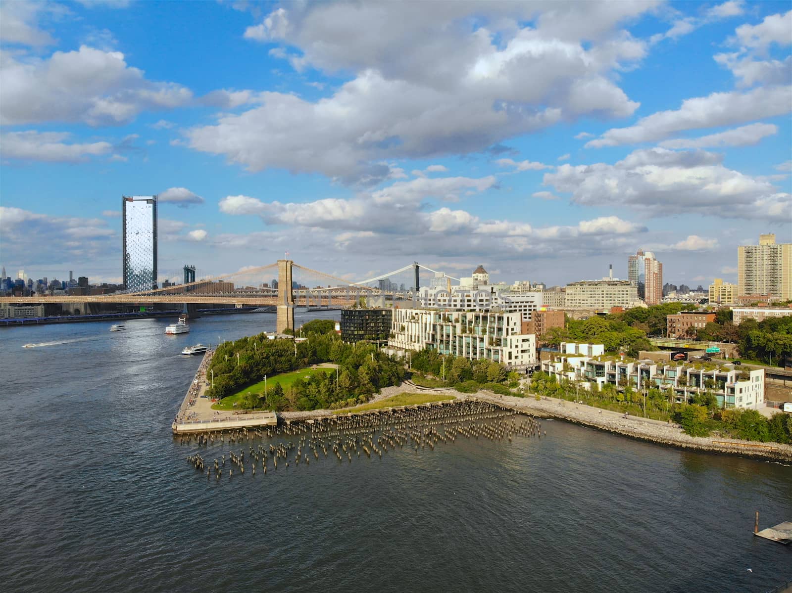 Aerial view of Brooklyn Park Pier with Hudson River and Brooklyn Bridge on the background. New York City. USA