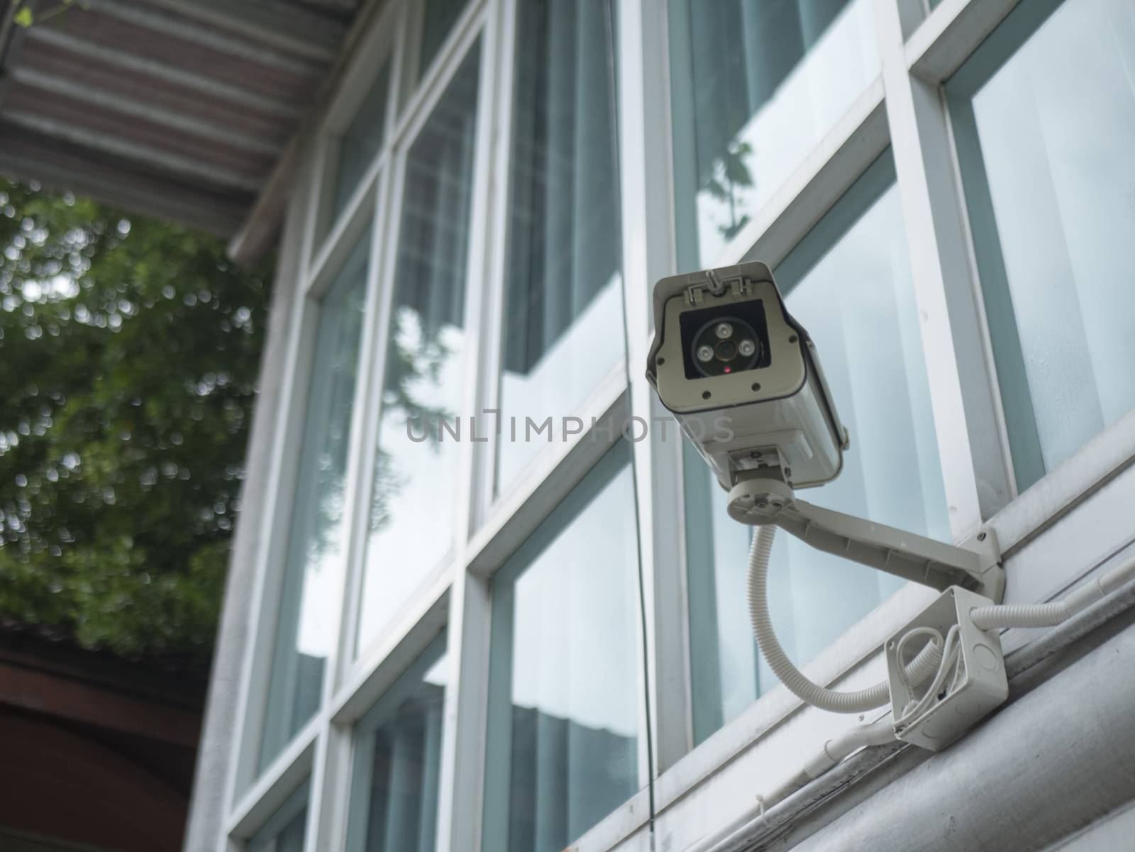 CCTV security camera outside office building.