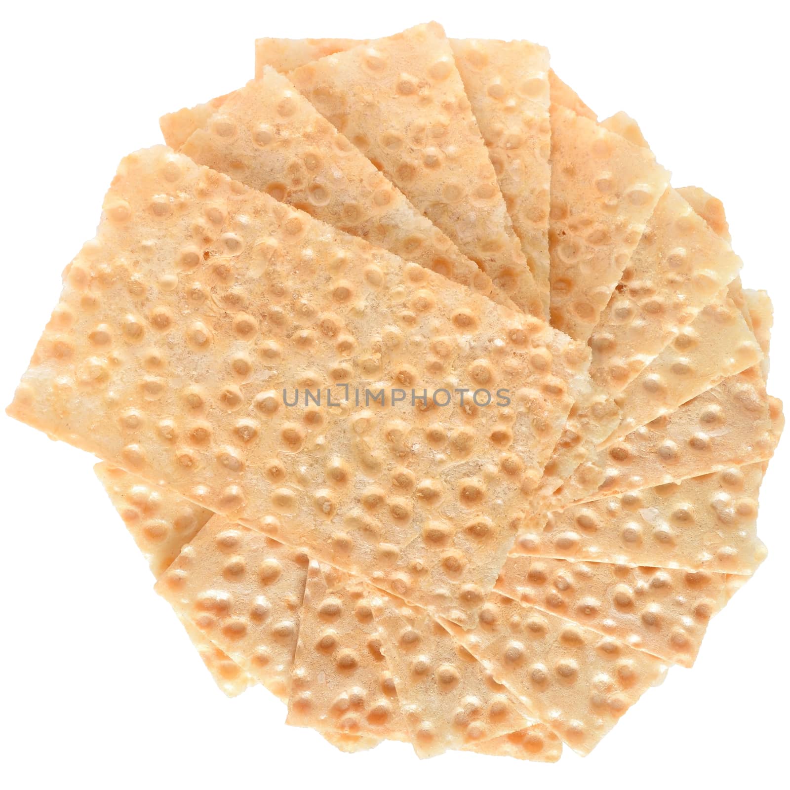 Heap slice of crispbread top view on white background.