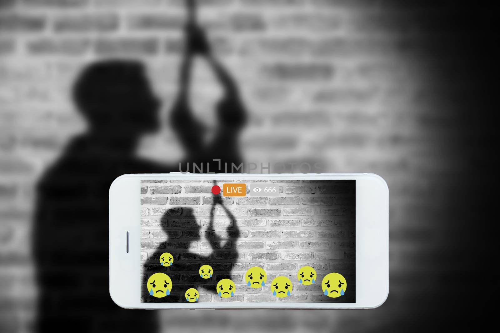 Problem of using social networks with wrong purpose effect concept:silhouette of sad man hanging suicide stream his commits suicide stream live on social media. Crime ,violence within social networks. by asiandelight