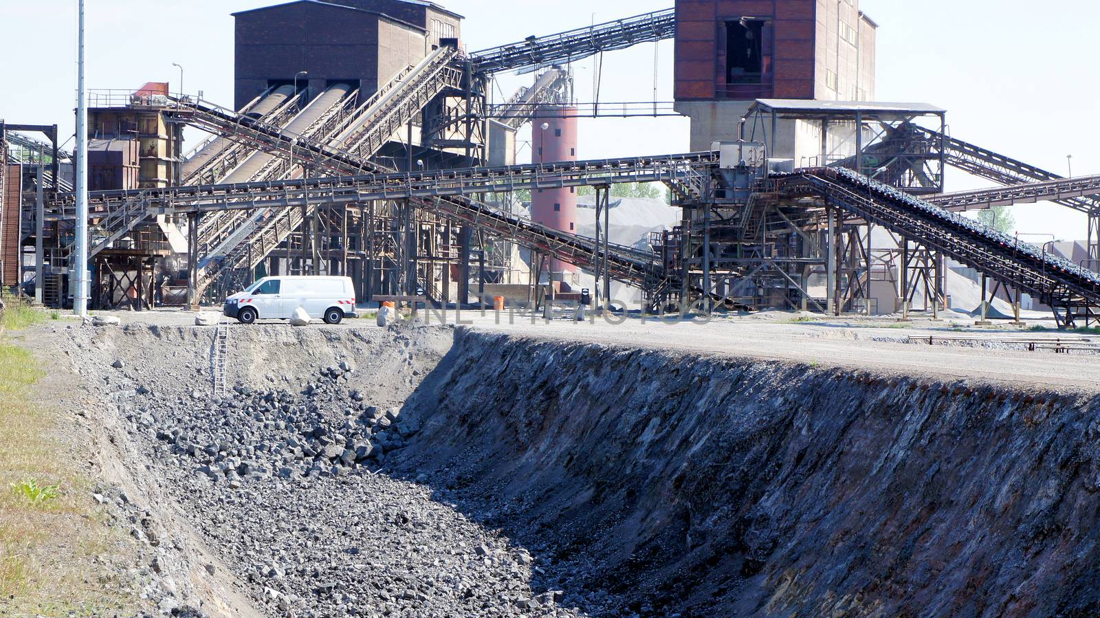 Slag chute on the grounds of a large steel mill and an ironworks, heiß