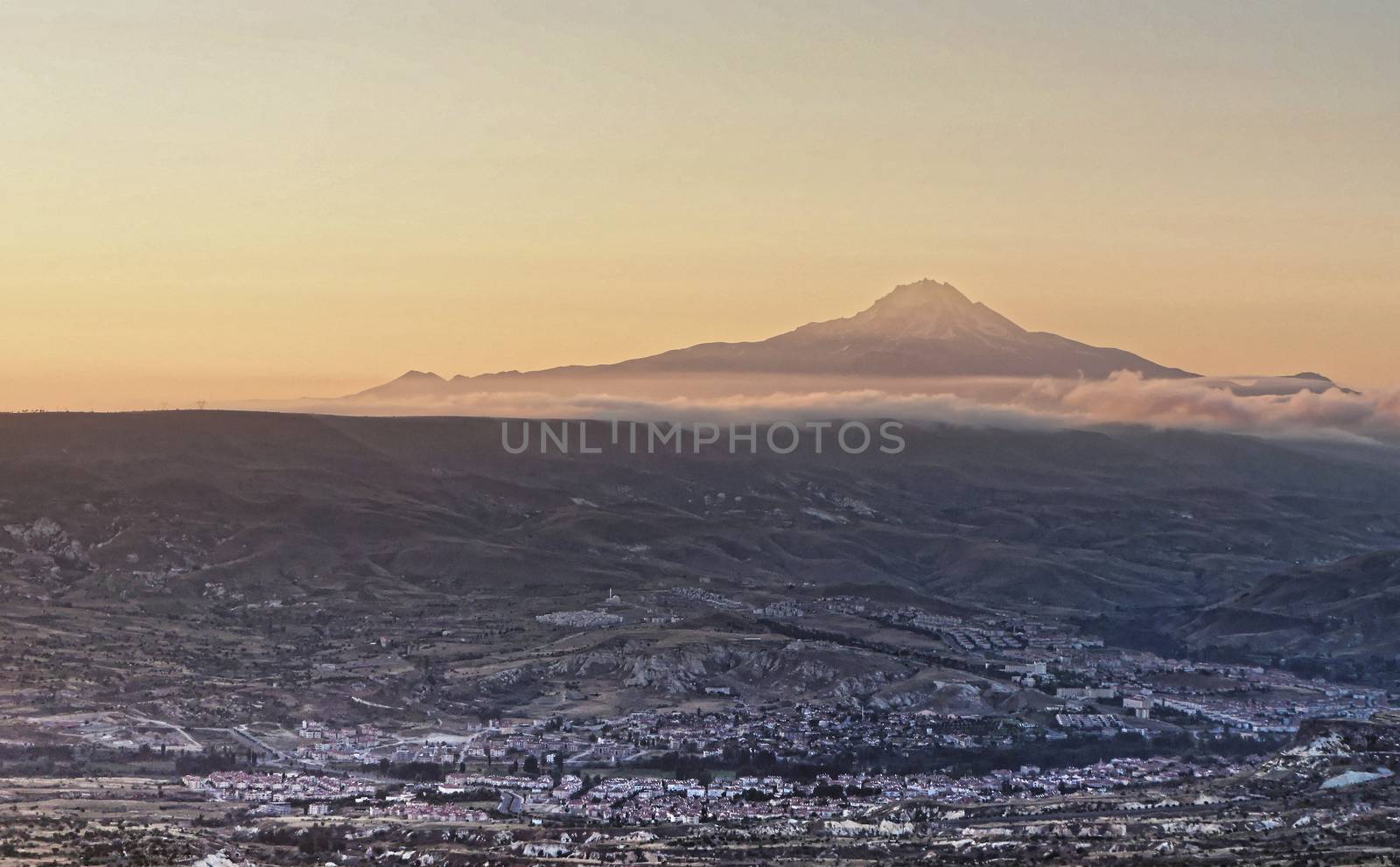 The sleeping giant, view of the volcano Erciyes near Kayseri in Anatolia, Turkey, with the villages of Cappadocia in the foreground, aerial view from the hot-air balloon.