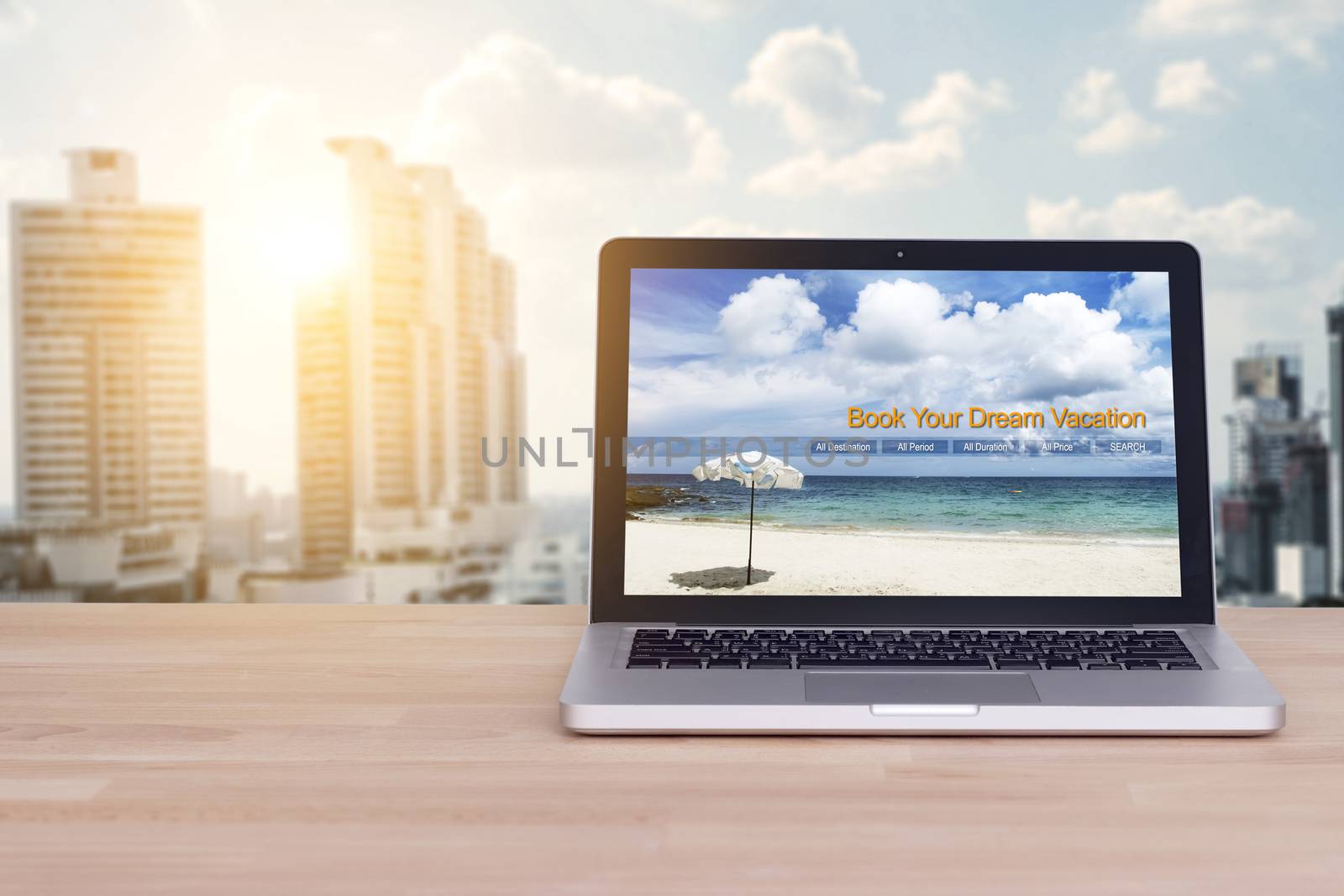 Travel, holiday , vacation planning concept : laptop with website book your dream vacation on screen at office work space for business people planning trip for relax on holiday by asiandelight