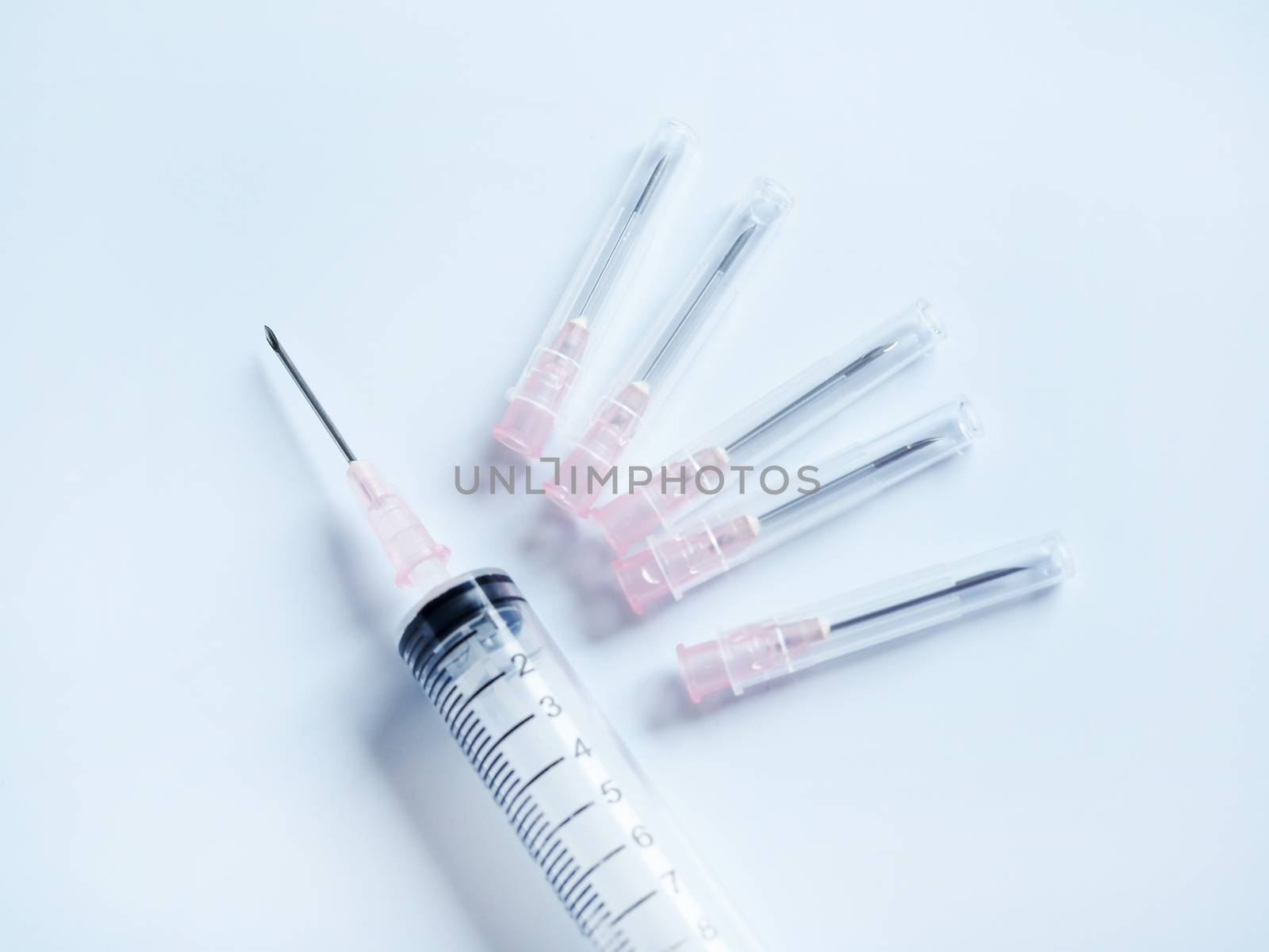 Syringe needle hypodermic injection of sick dog by kittima05
