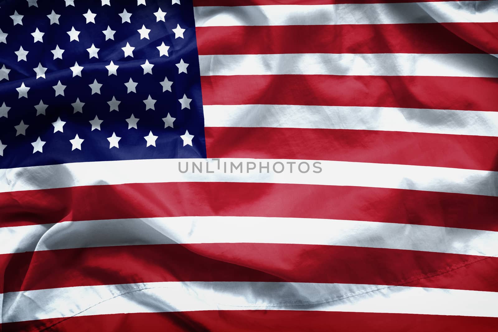 American flag background. Closeup of ruffled American flag by asiandelight