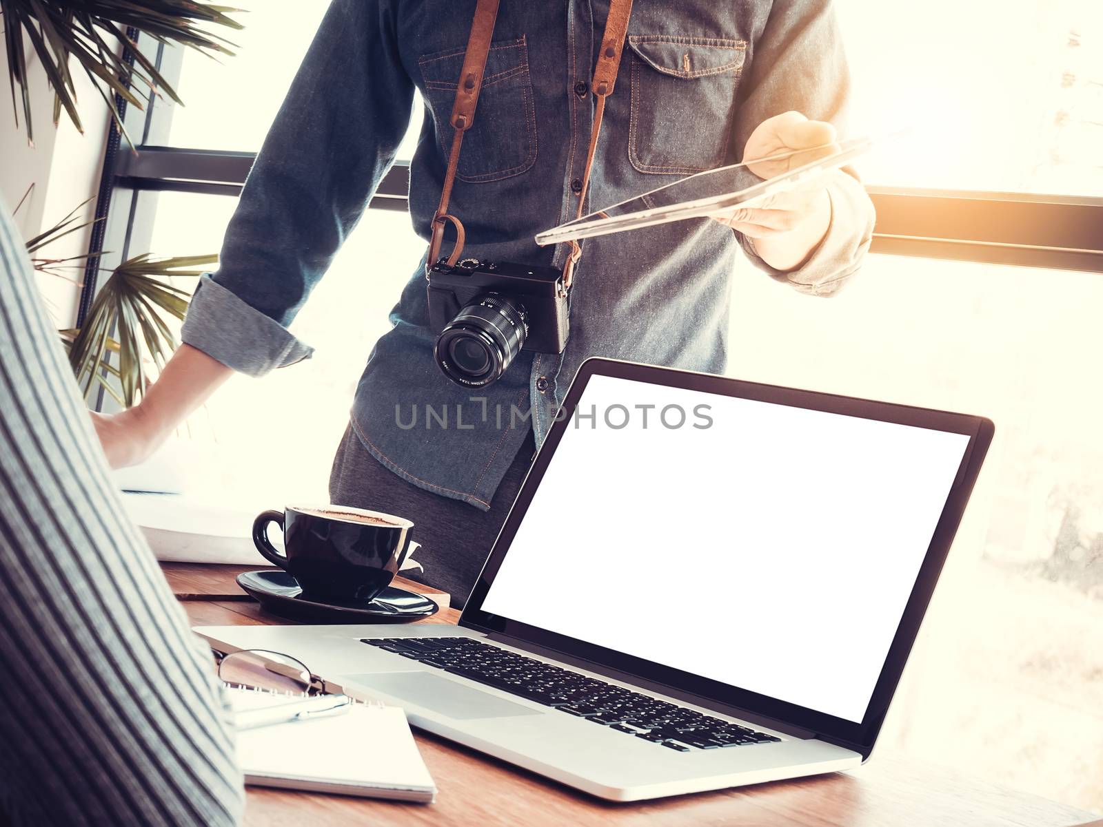 Startup business teamwork concept. Group of young Asian coworkers business people using laptop discussing about business creative project. Startup business in Asia. Anonymous face by asiandelight