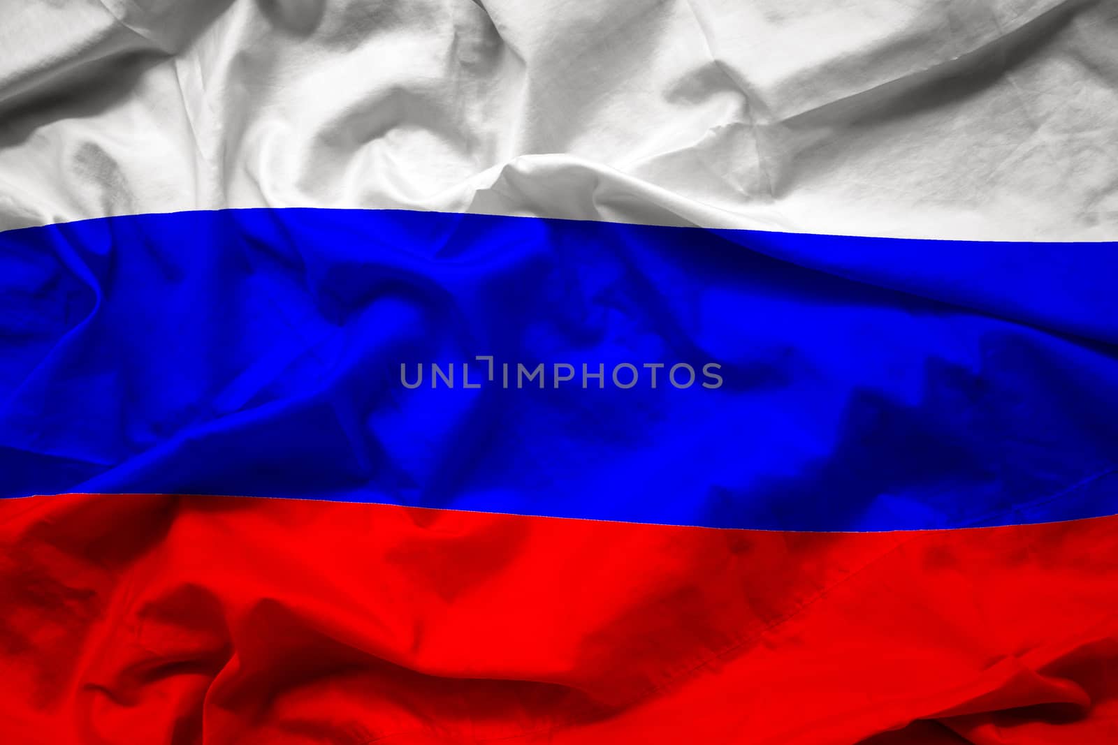 waving colorful national flag of russia , russian federation on silk texture