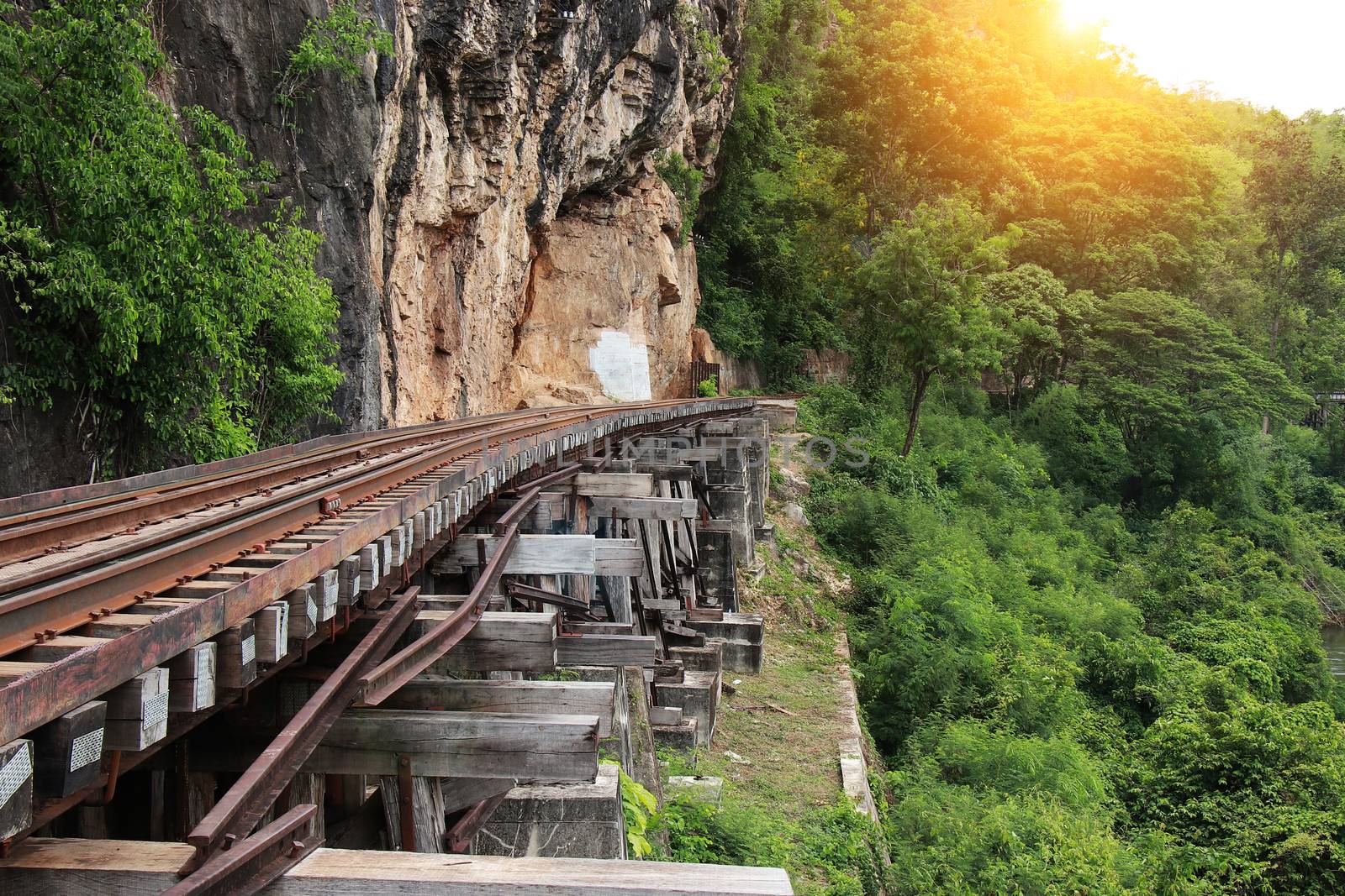 Train ride on the Death railway (river Kwai, Thailand). Death Railway train passing over the Tham Krasae Viaduct. Thai - Burma Railway