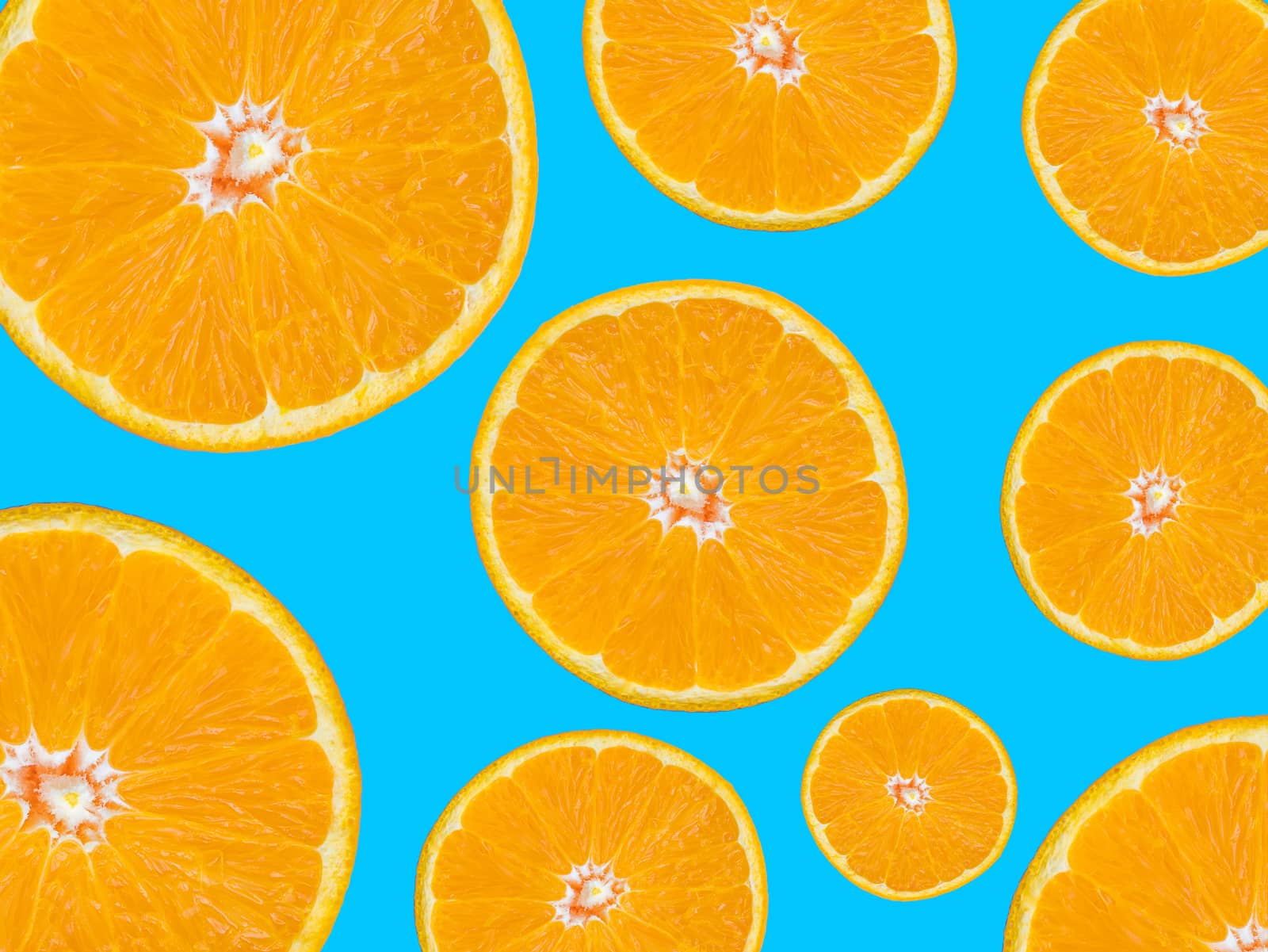 Orange slices pattern on blue background, pop art style by asiandelight
