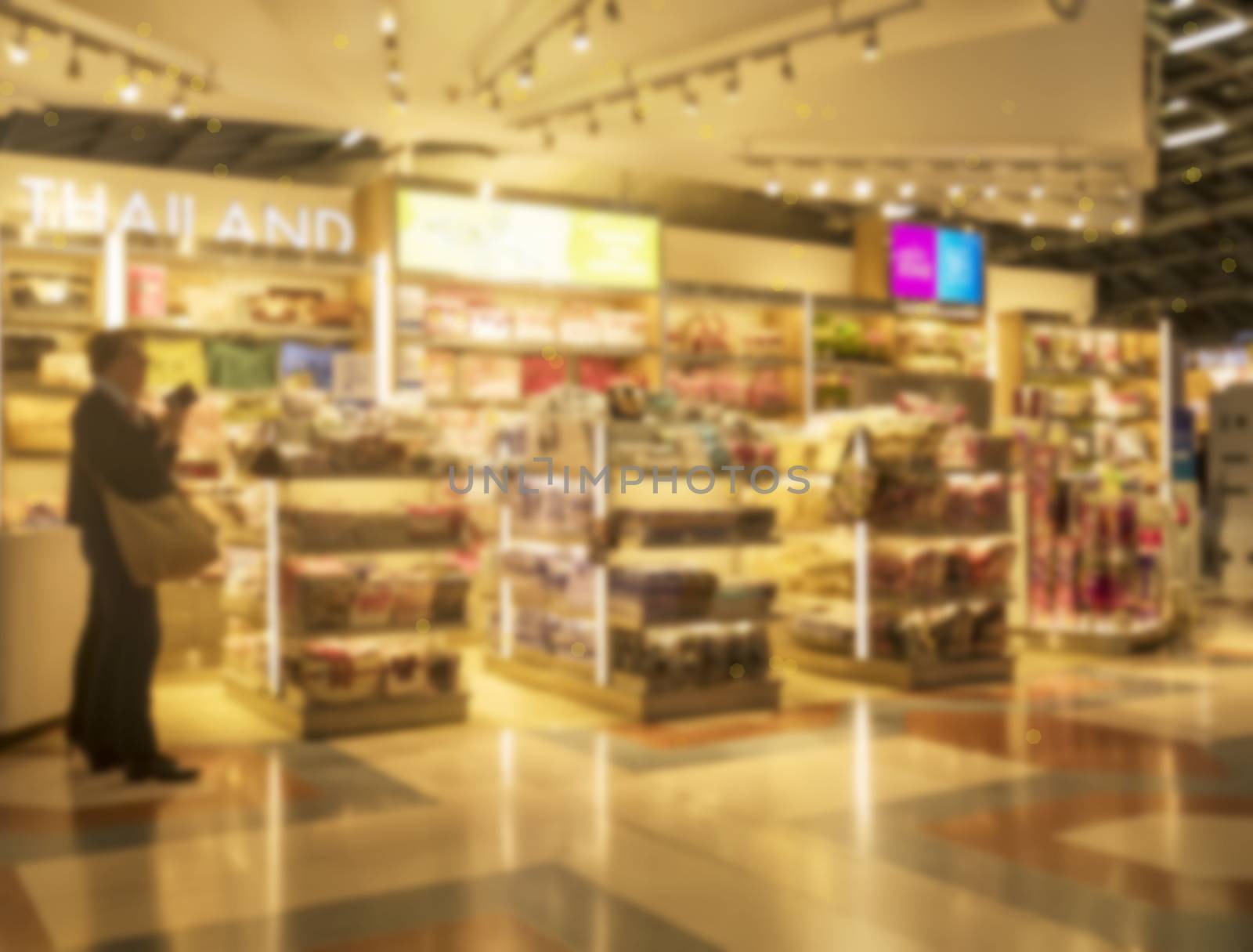 Store blur background with warm light with sign THAILAND