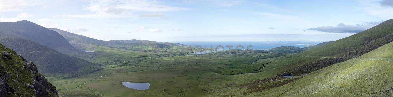 panoramic view of the mountains in county kerry by morrbyte