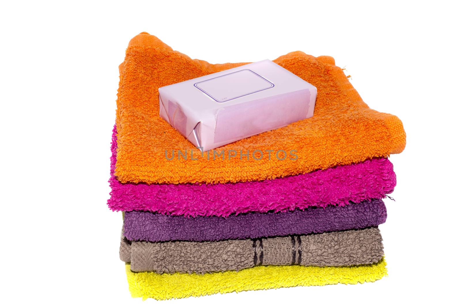 soap on top of facecloths of various shades