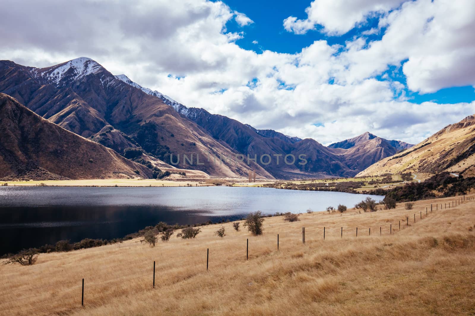 The stunning idyllic Moke Lake near Queenstown in Otago, New Zealand. This secluded, peaceful lake is a popular locale for camping, boating, hiking and horseback riding.
