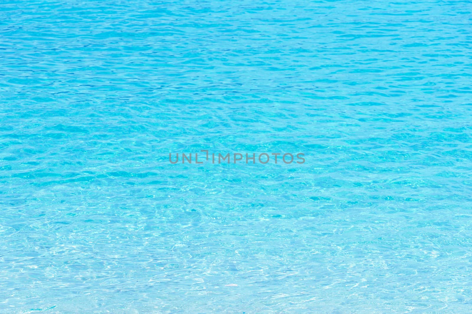 Transparent blue sea water background by pkproject