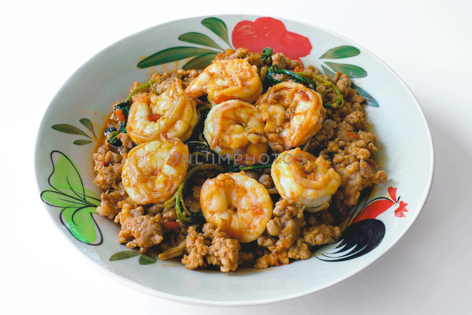 Thai Spicy food Stir fried minced pork and shrimps with basil.