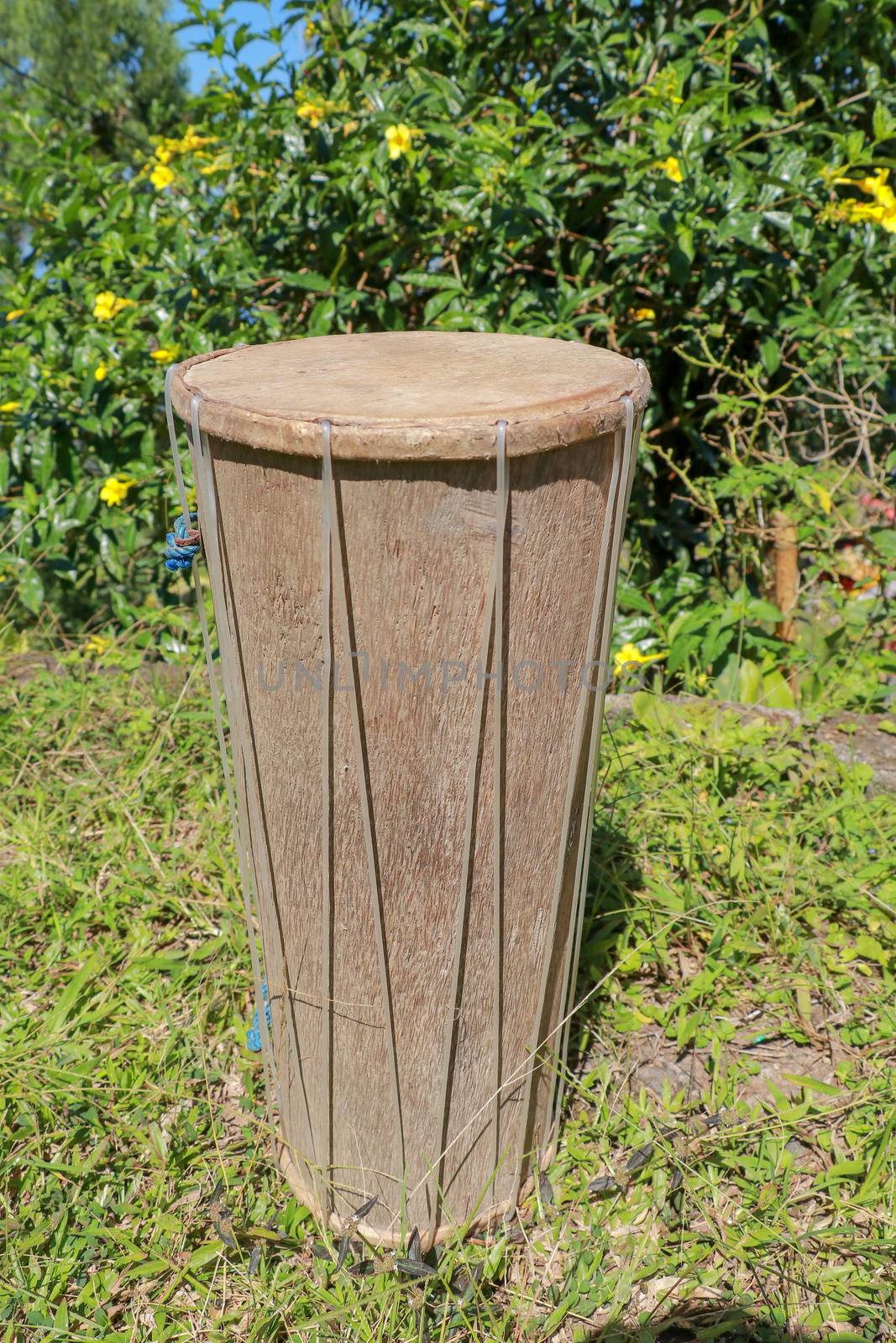 Traditional drums and other musical instruments on the ground to be used in the Hindu religious ceremony in Bali Indonesia.