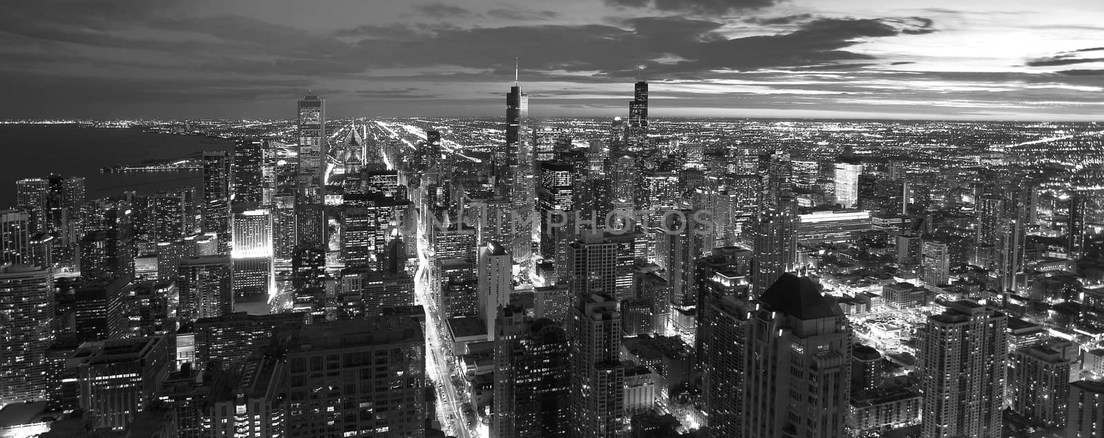 Atmospheric scene of Chicago at night showing Michigan Avenue and downtown