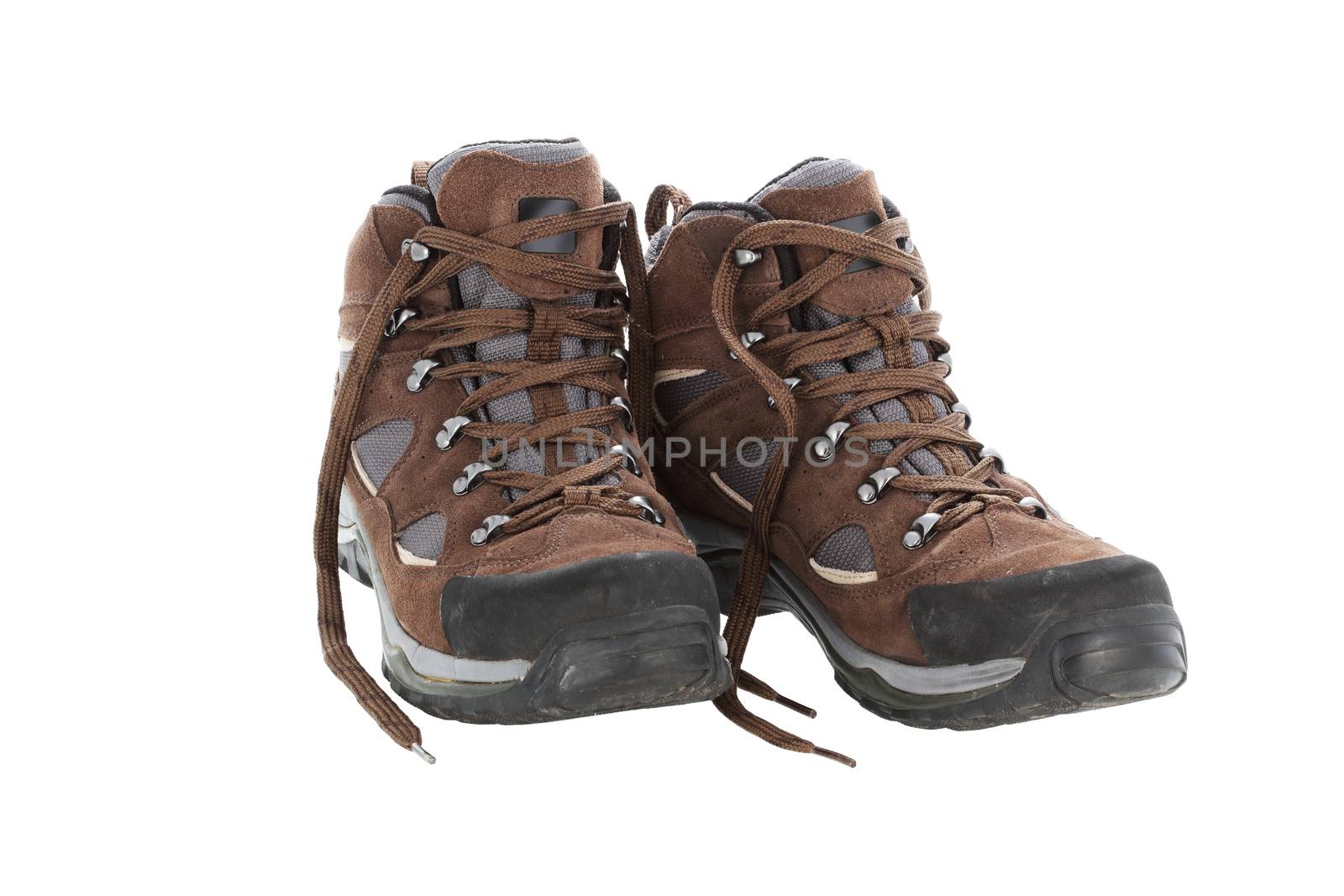 Brown hiking boots isolated on a white background