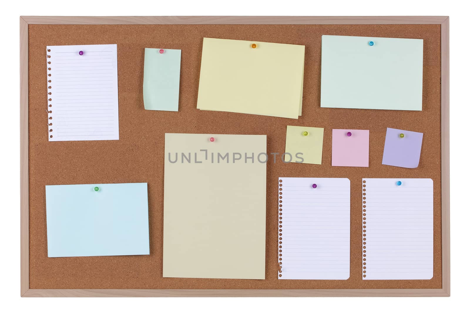 Paper reminder notices on a cork notice board on white background with clipping path
