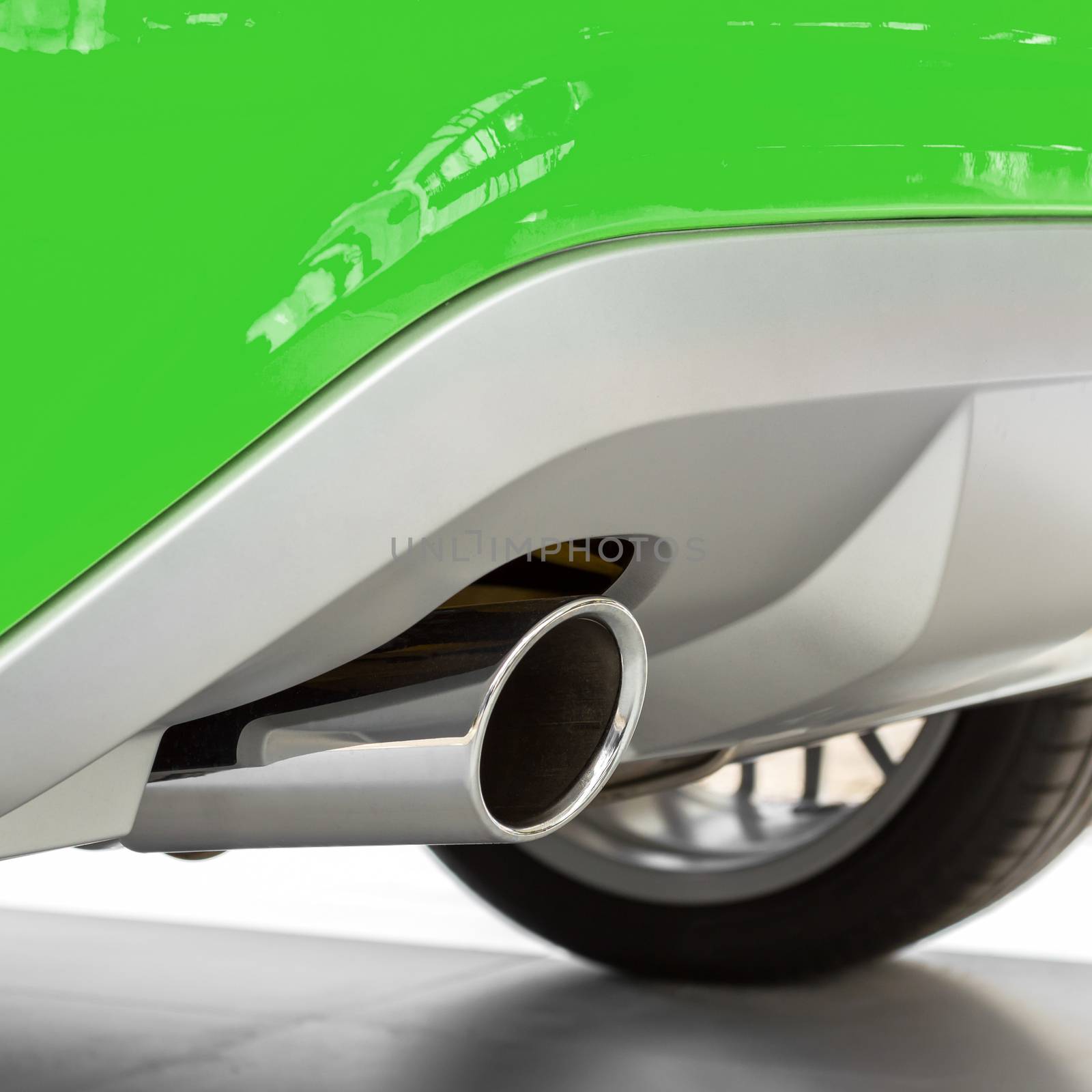 Eco car with new exhaust of a sports car. Ecology concept, low emission, low environmental impact.