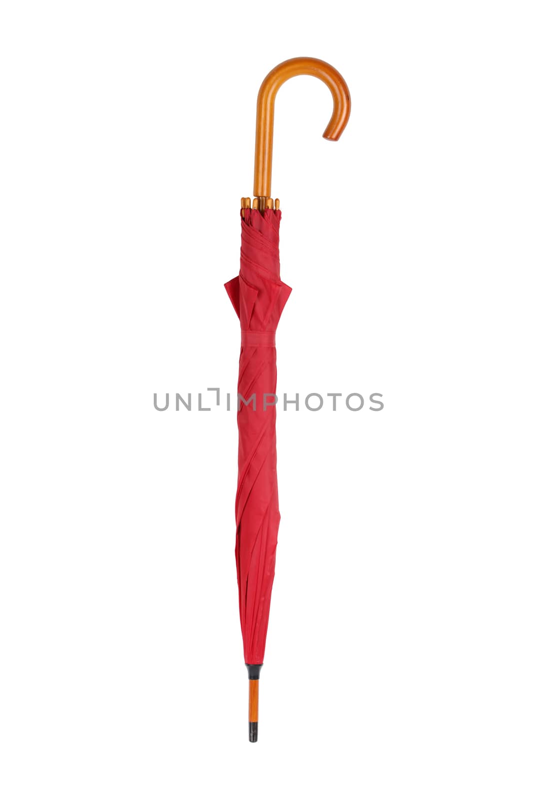 Closed red umbrella isolated on white with clipping path by VivacityImages