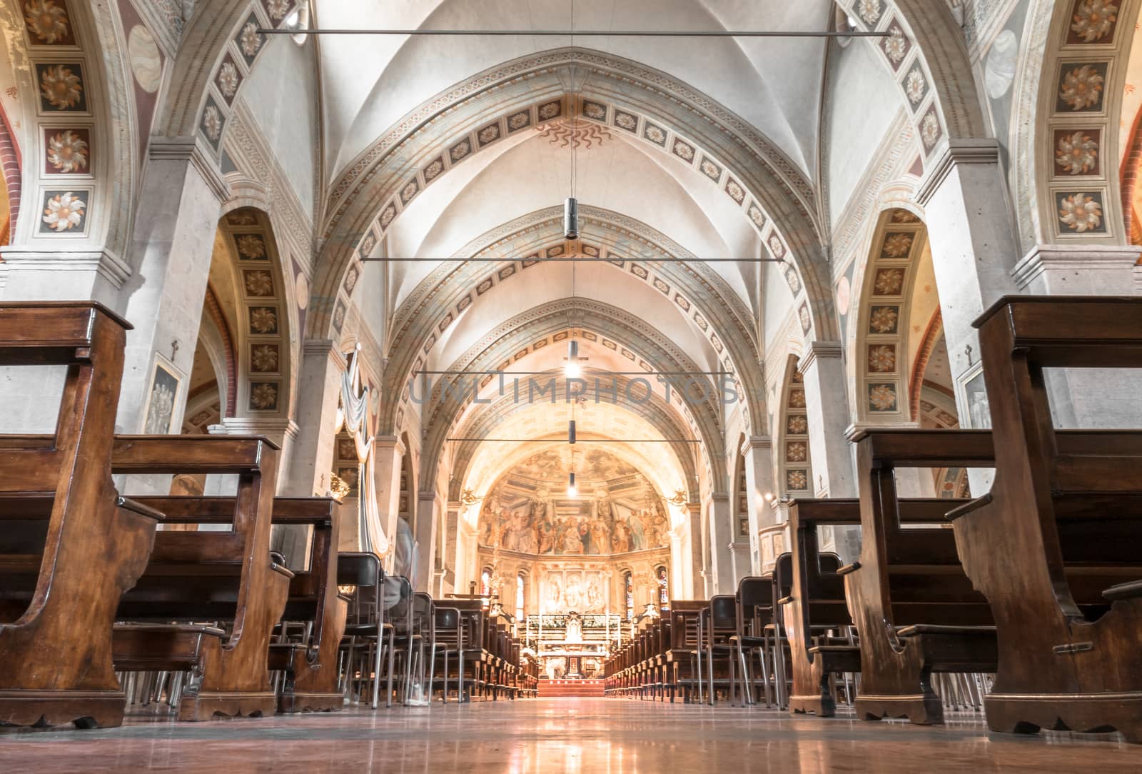 Inside a church in italy. Symbol of Christianity and Catholicism. Ideal for concepts or festivity. Bottom view.