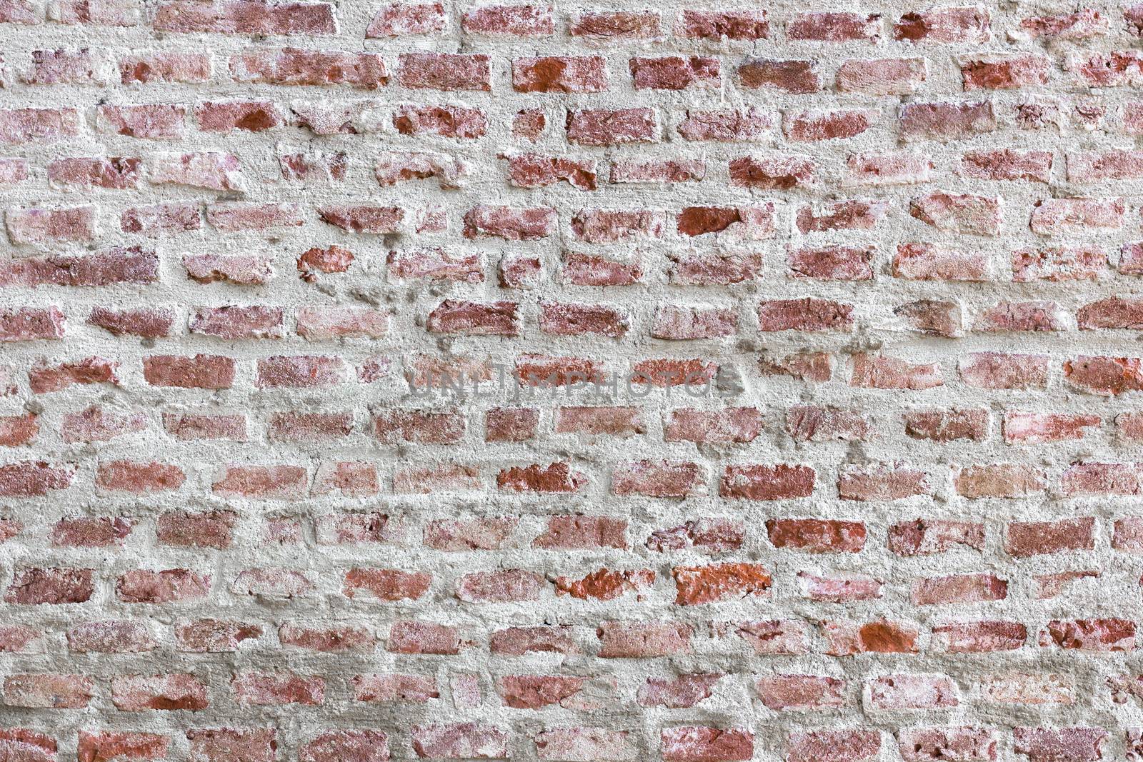 cracked brick work background by germanopoli